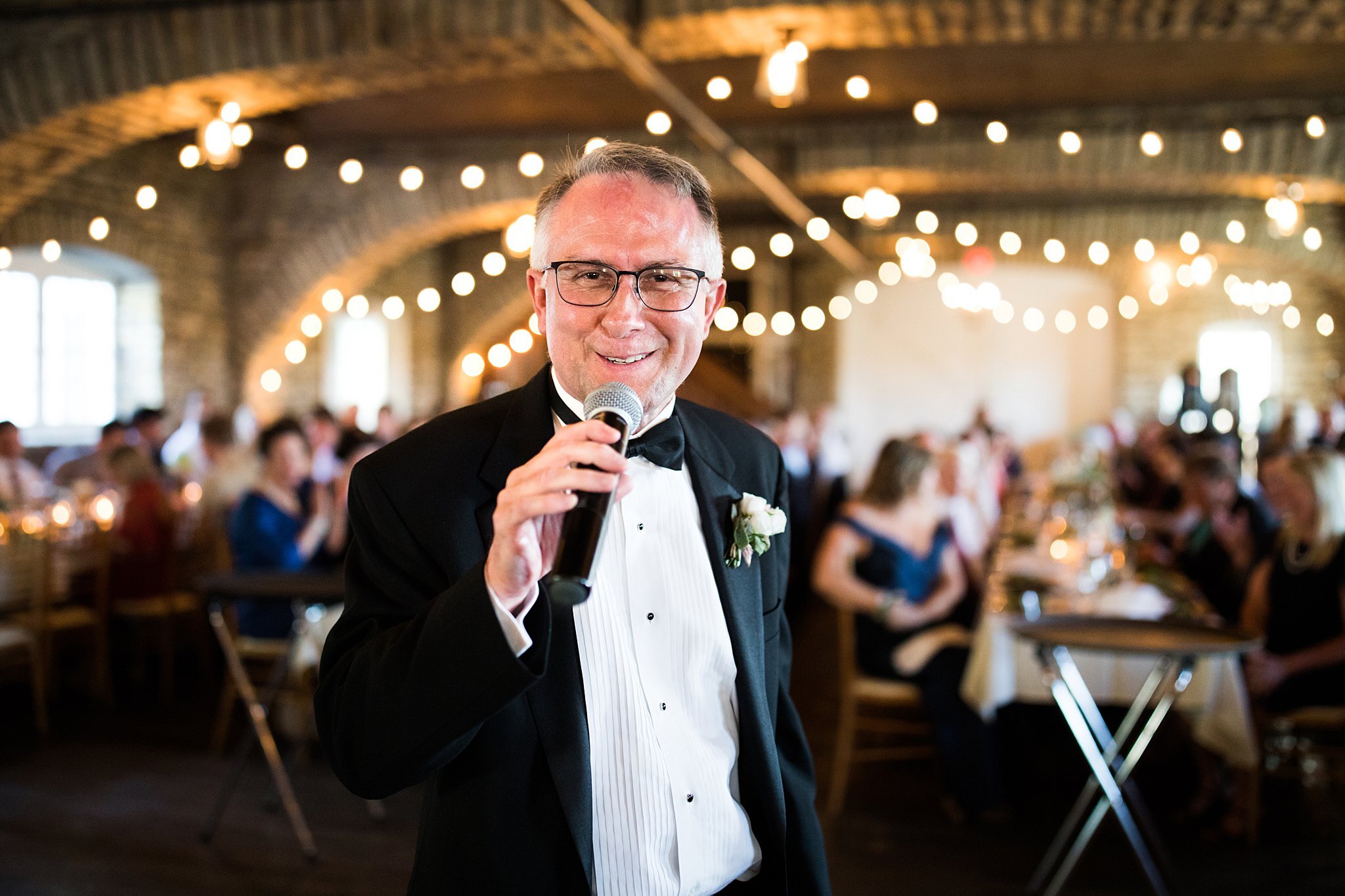  Bride's father checks the mic at Mayowood Stone Barn. 