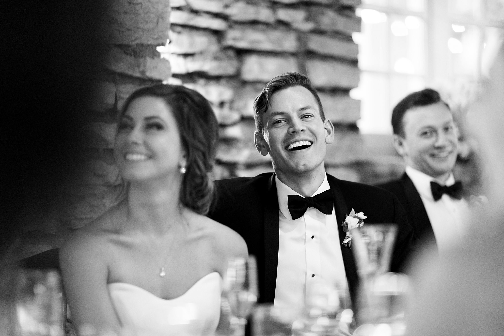  Bride and groom seated at head table. 