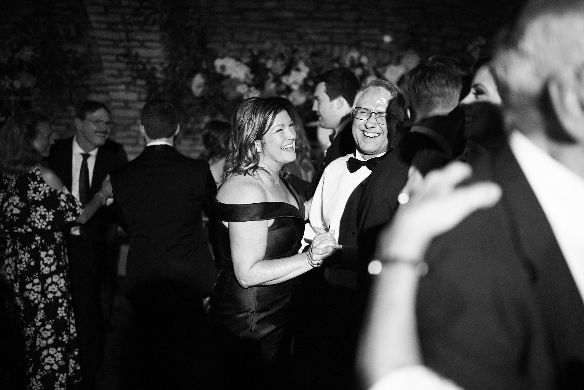  Bride's parents dancing on the dance floor. 