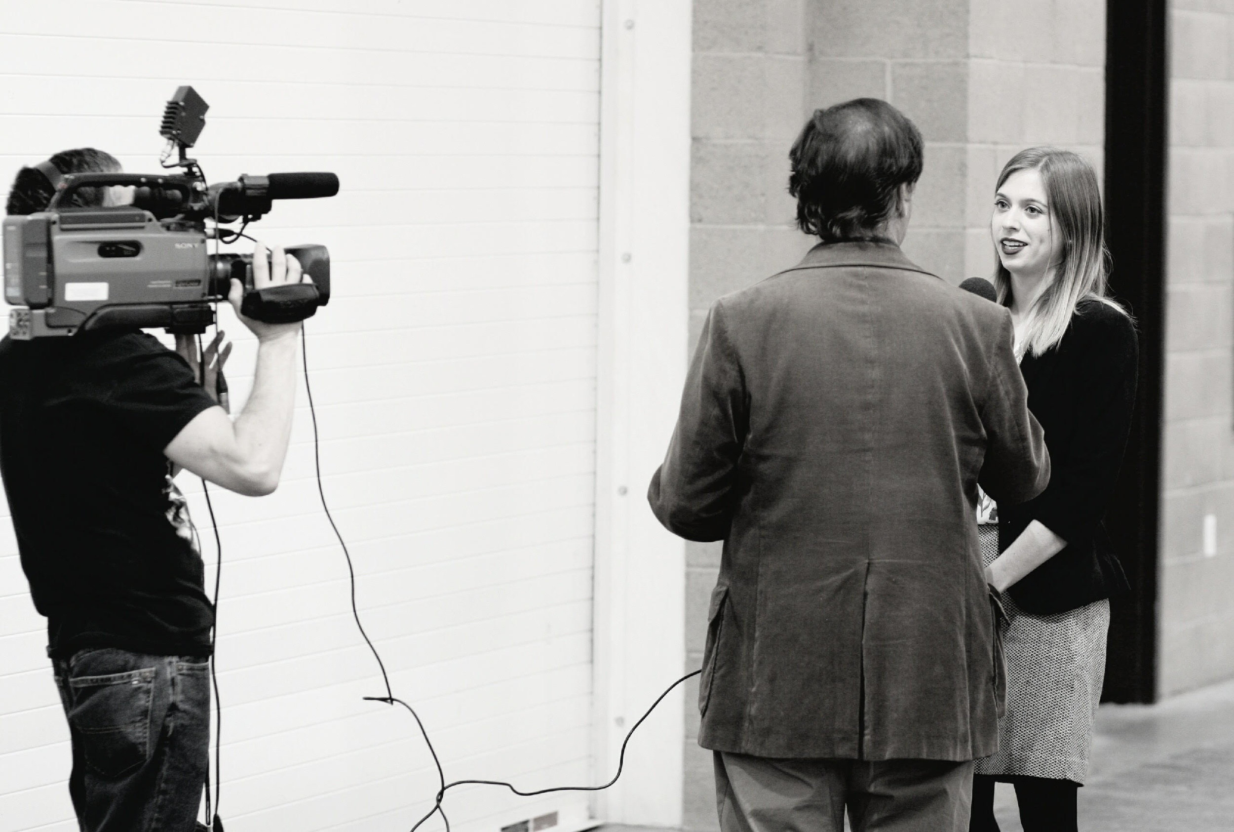 Public television interview with Out and About hosts.