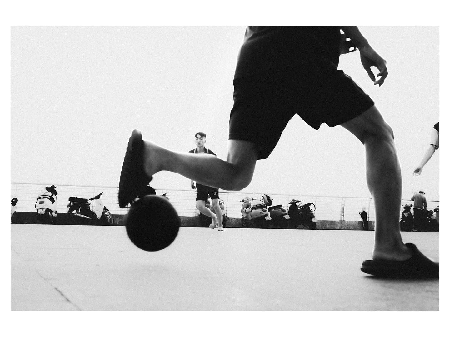 This is usually a lookout spot where people enjoy the sun falling into the sea. But on this hazy and overcasted day these kids turned the spot into a football field.  No shoes, no grass no problem. ⚽📸

📷 @fujifilmx_us
🎨 @Lightroom
&copy; Wes Marsa