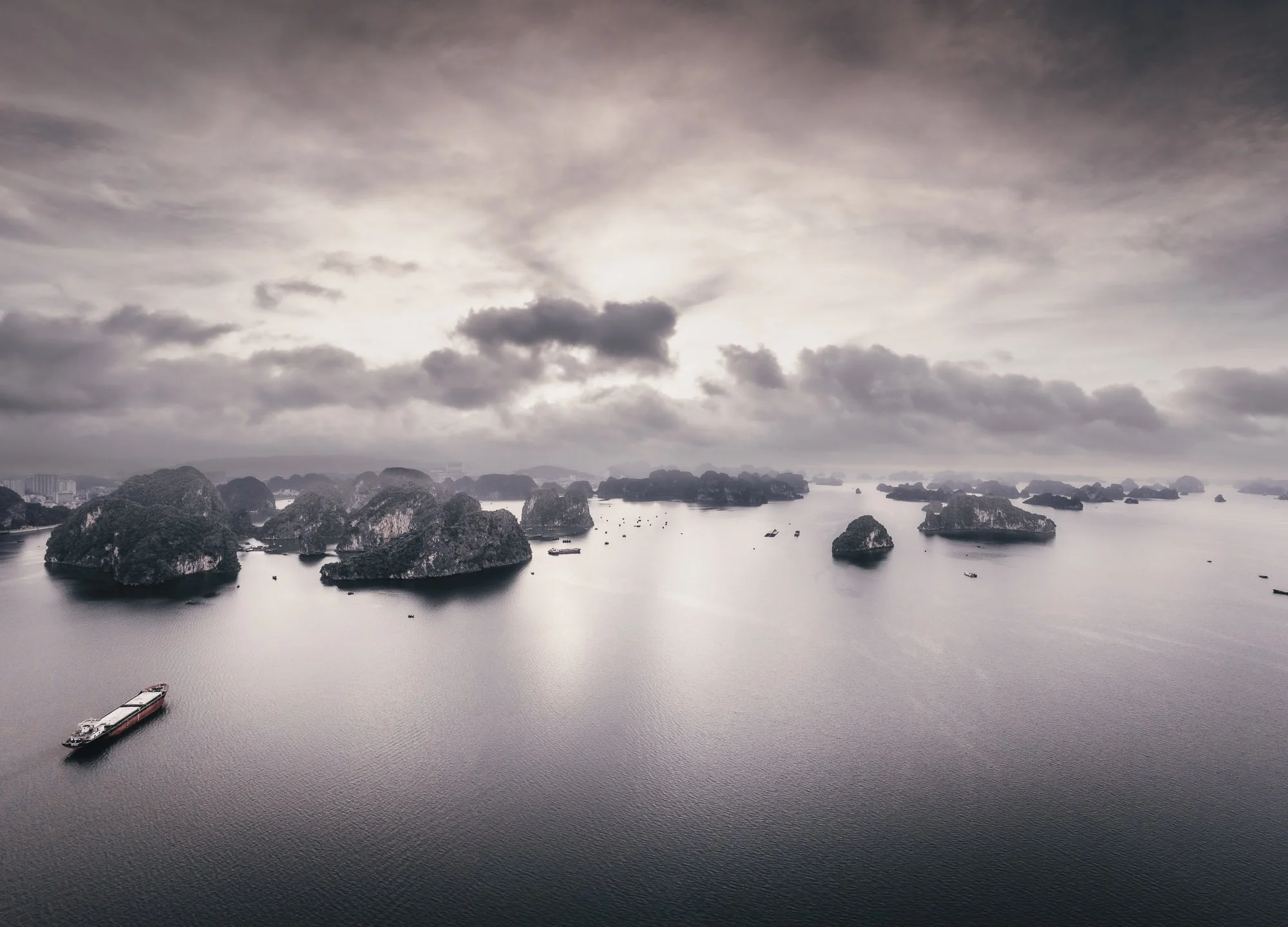 A tanker among the karsts of Ha Long Bay, Vietnam
