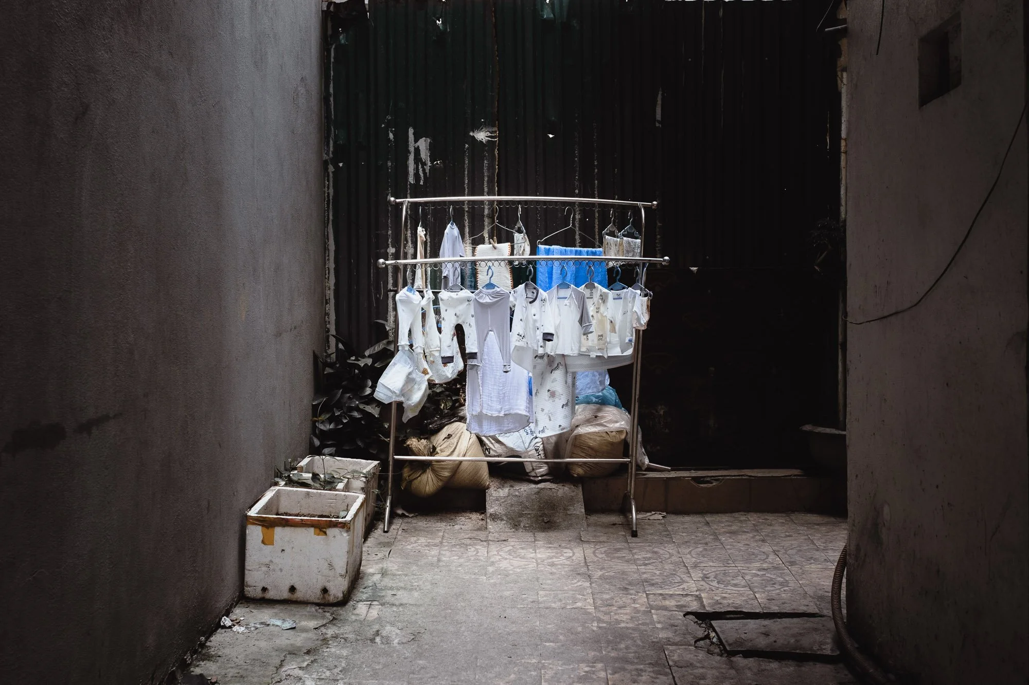 Children's Laundry hanging on a drying rack, Hon Gai, Vietnam.