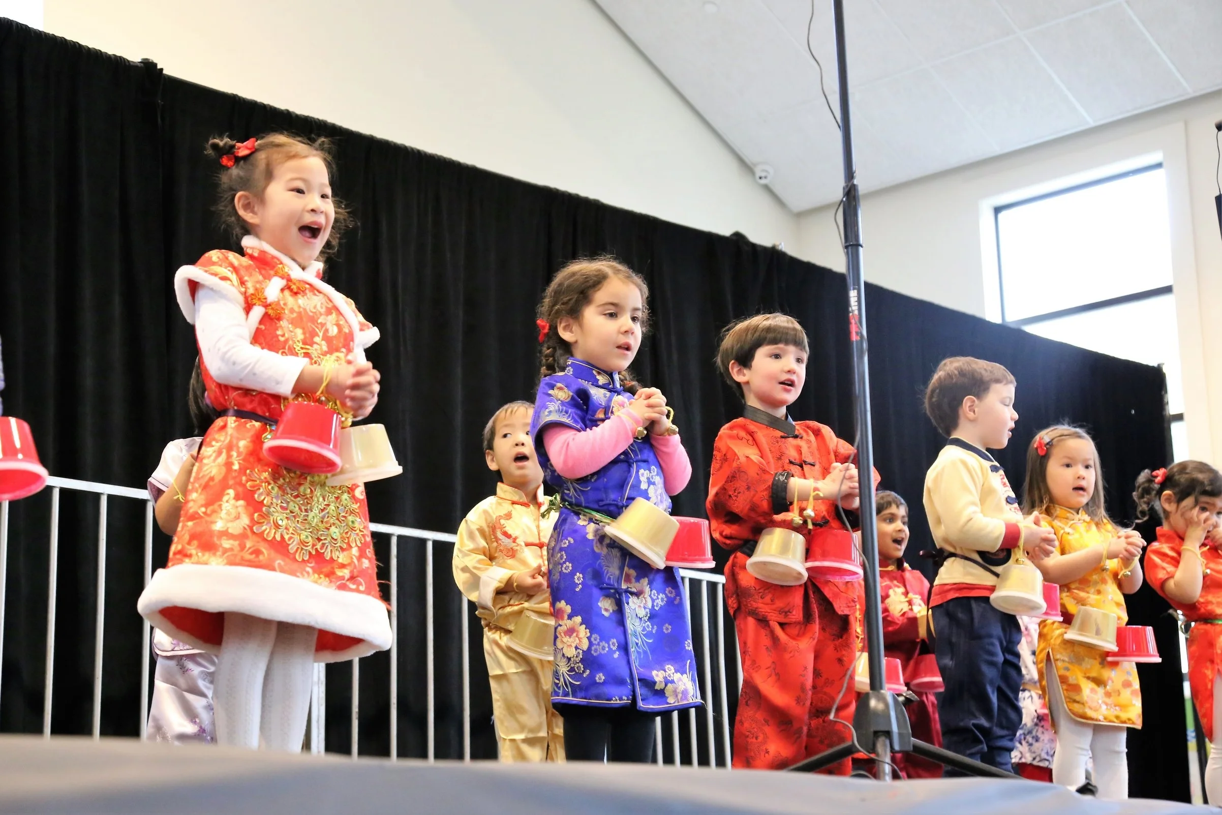 The Apple Tree preschool class performing their song.