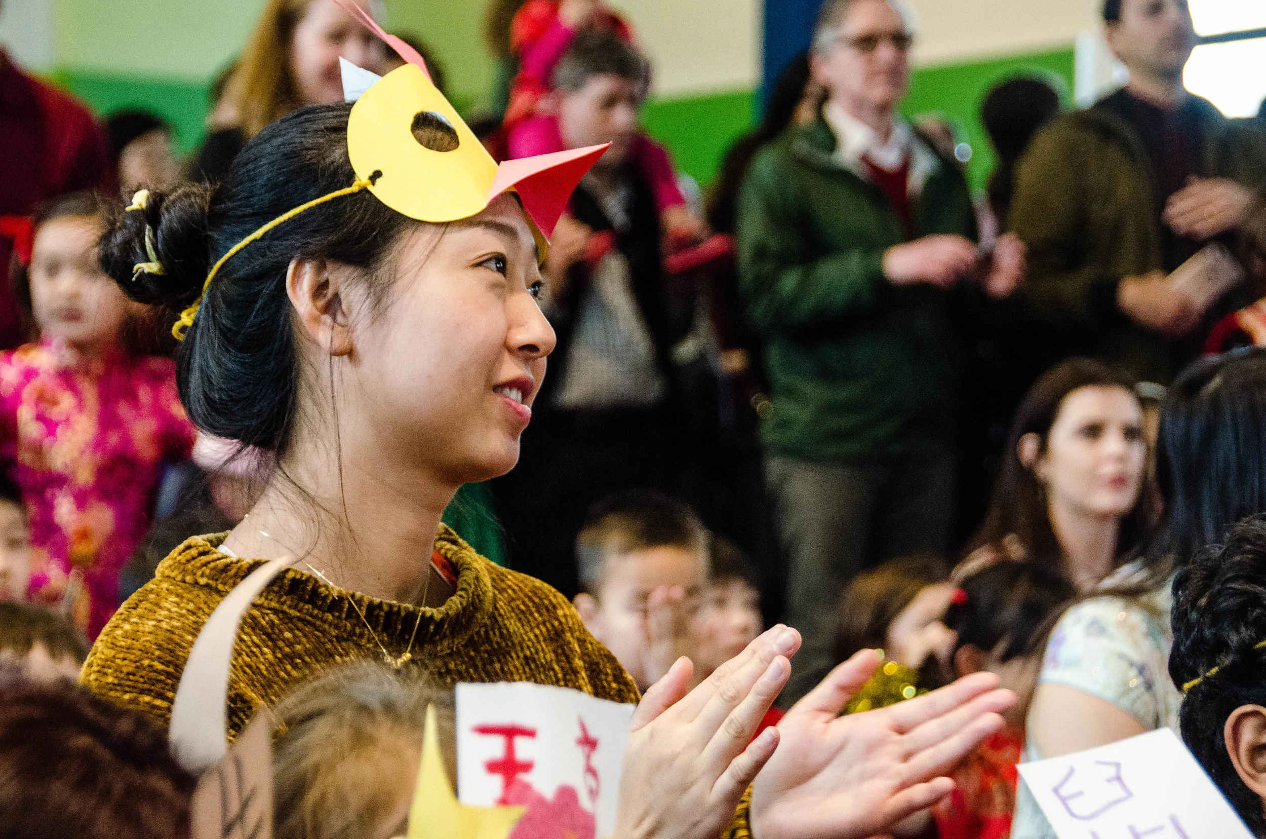 Teachers, families, and friends enjoy elementary performances.