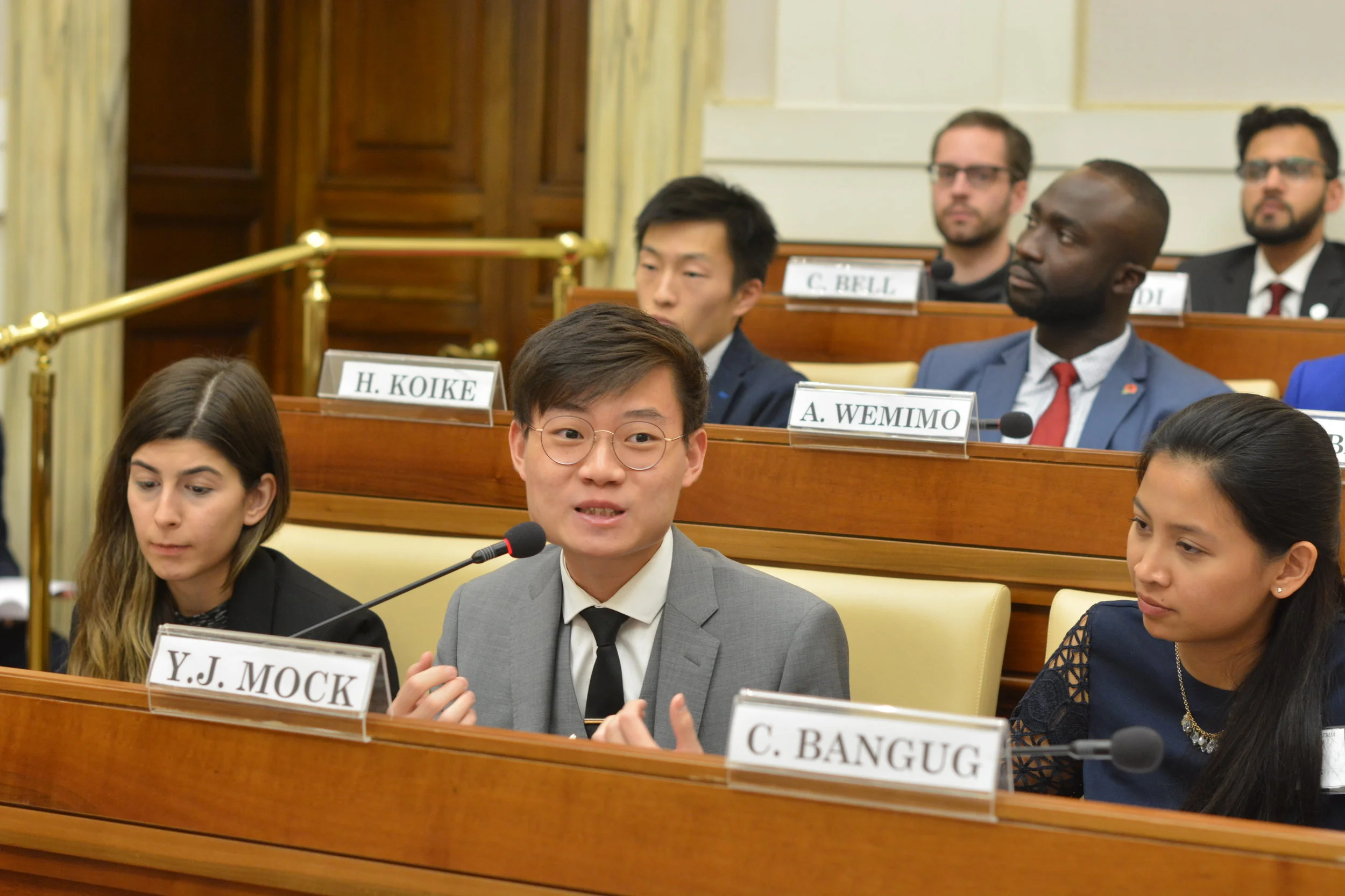 Yi Jun Mock, Project Lead with SDSN Youth, announces the SDG Students Program. Photo Credits: Gabriella Marino/PAS