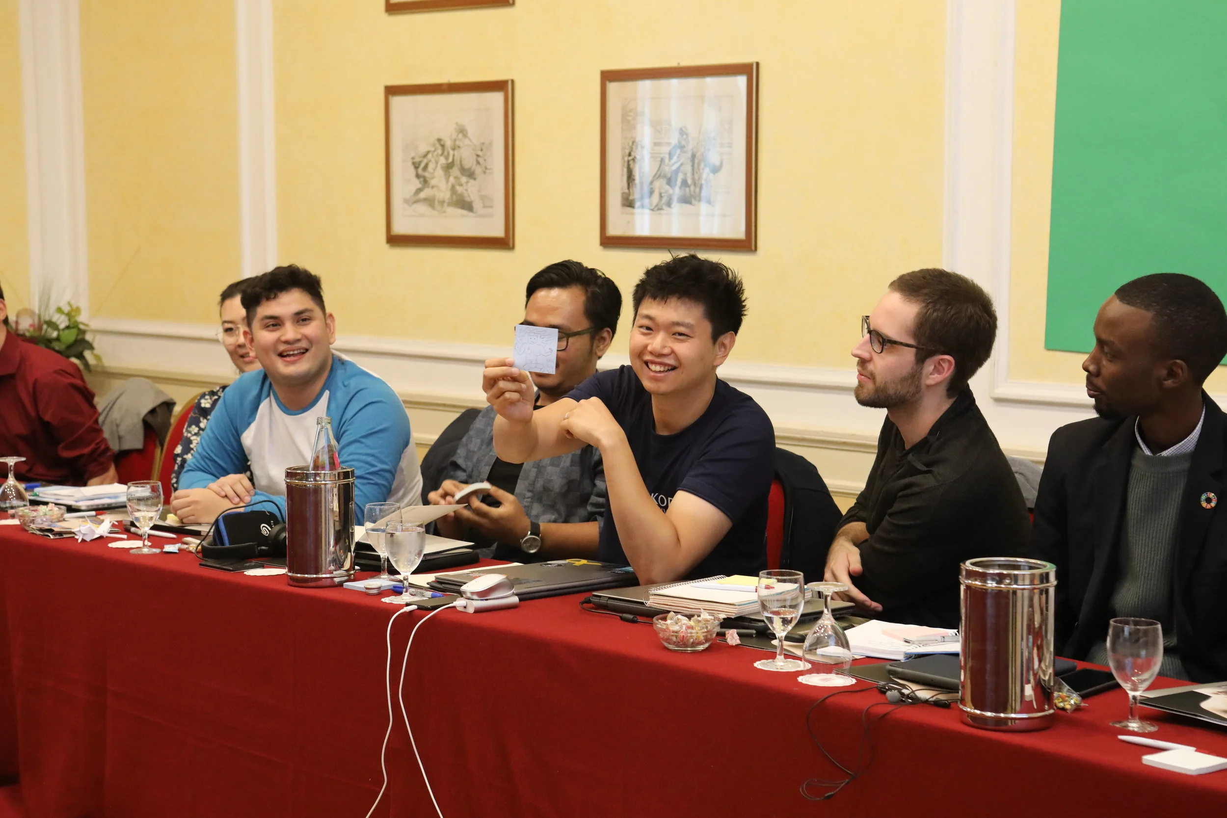 Dong-ryul Kang shows the team his inner robot, much to their delight! Photo Credits: Yuntong Man/SDSN Youth