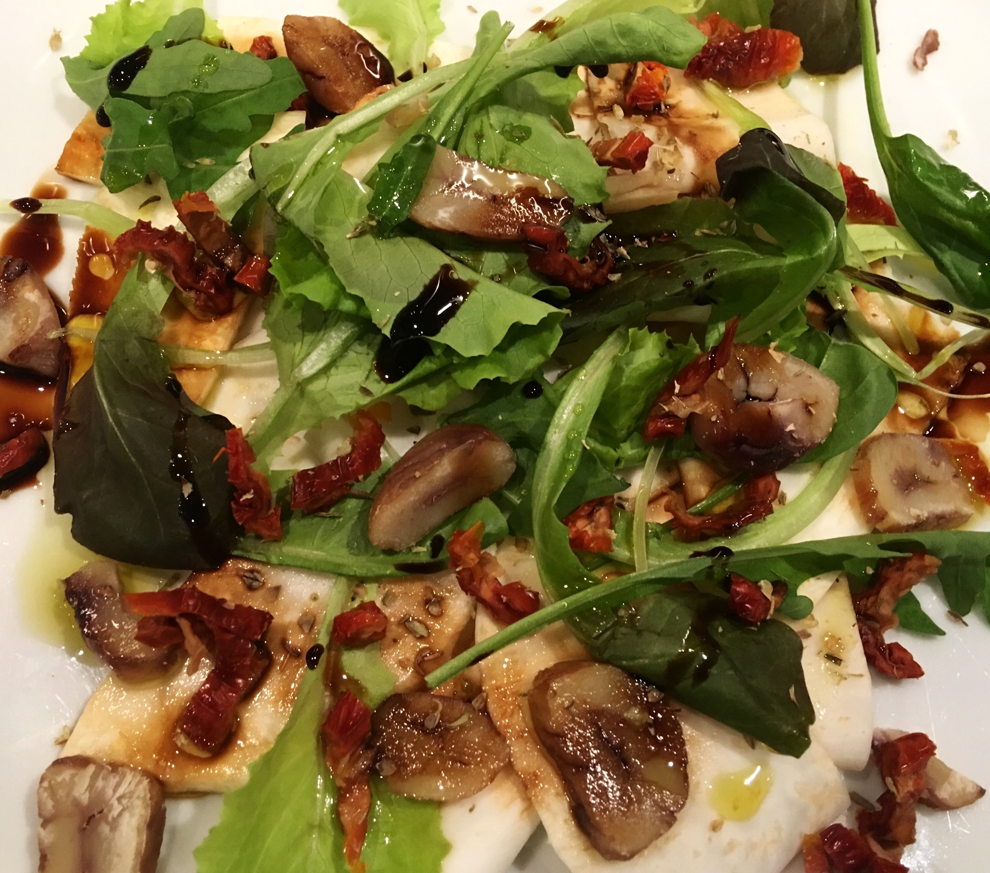 Carpaccio di Sedano rapa con Castagne e Pomodori secchi