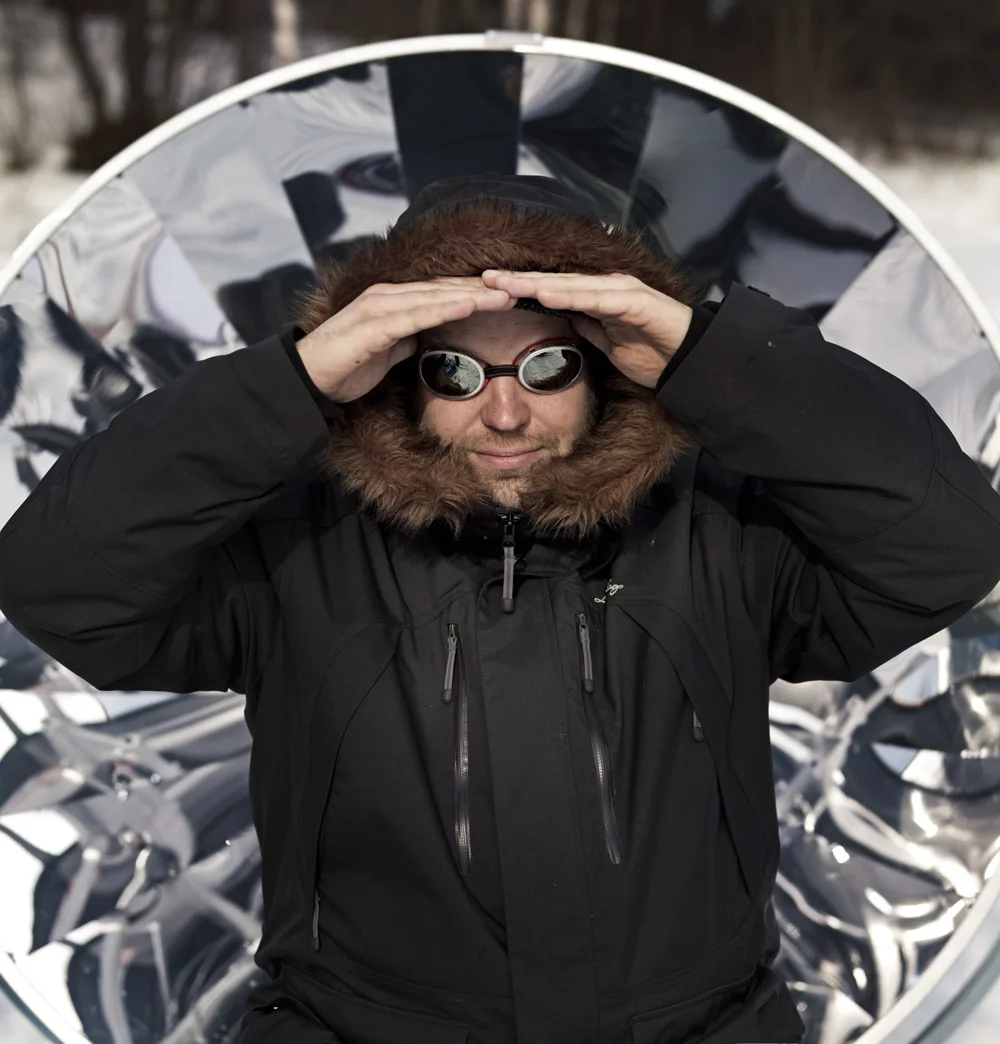Antto and a solar cooker.