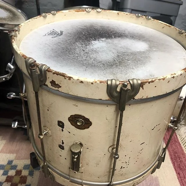 I got this old Slingerland snare drum for 15 or 20 bucks at an antique store while on tour in the South (Georgia i believe) with The Flying Neutrinos in 2001. It had an old calf skin head in good condition which was worth more than what i paid alone 