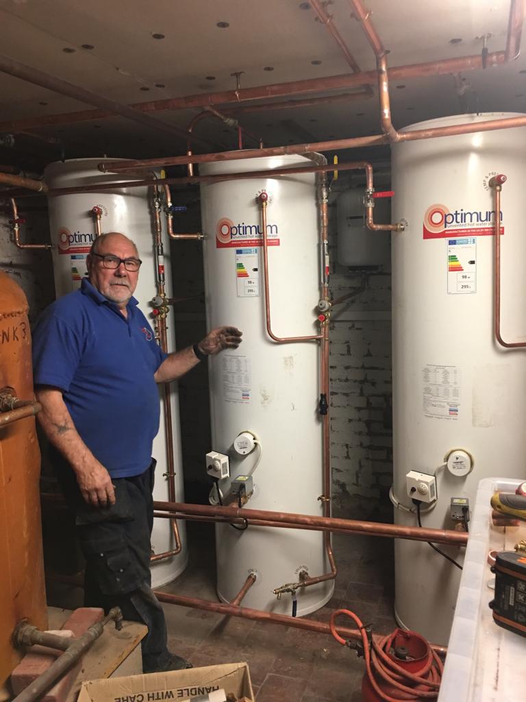 A bank of 3 domestic hot water cylinders