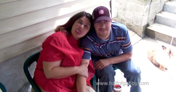 When I was heavy, if someone was taking my picture, I'd grab anything that was near me and put it in front of my body to try to hide my fat. In this case, I grabbed my hubby's arm. I HATED getting my picture taken.