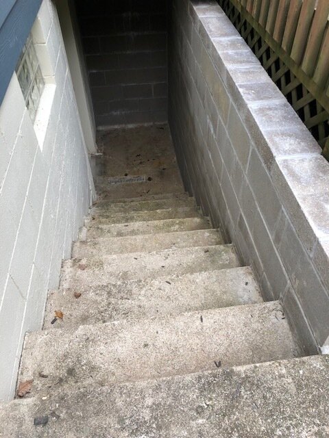 Concrete block basement entry wall photo 3