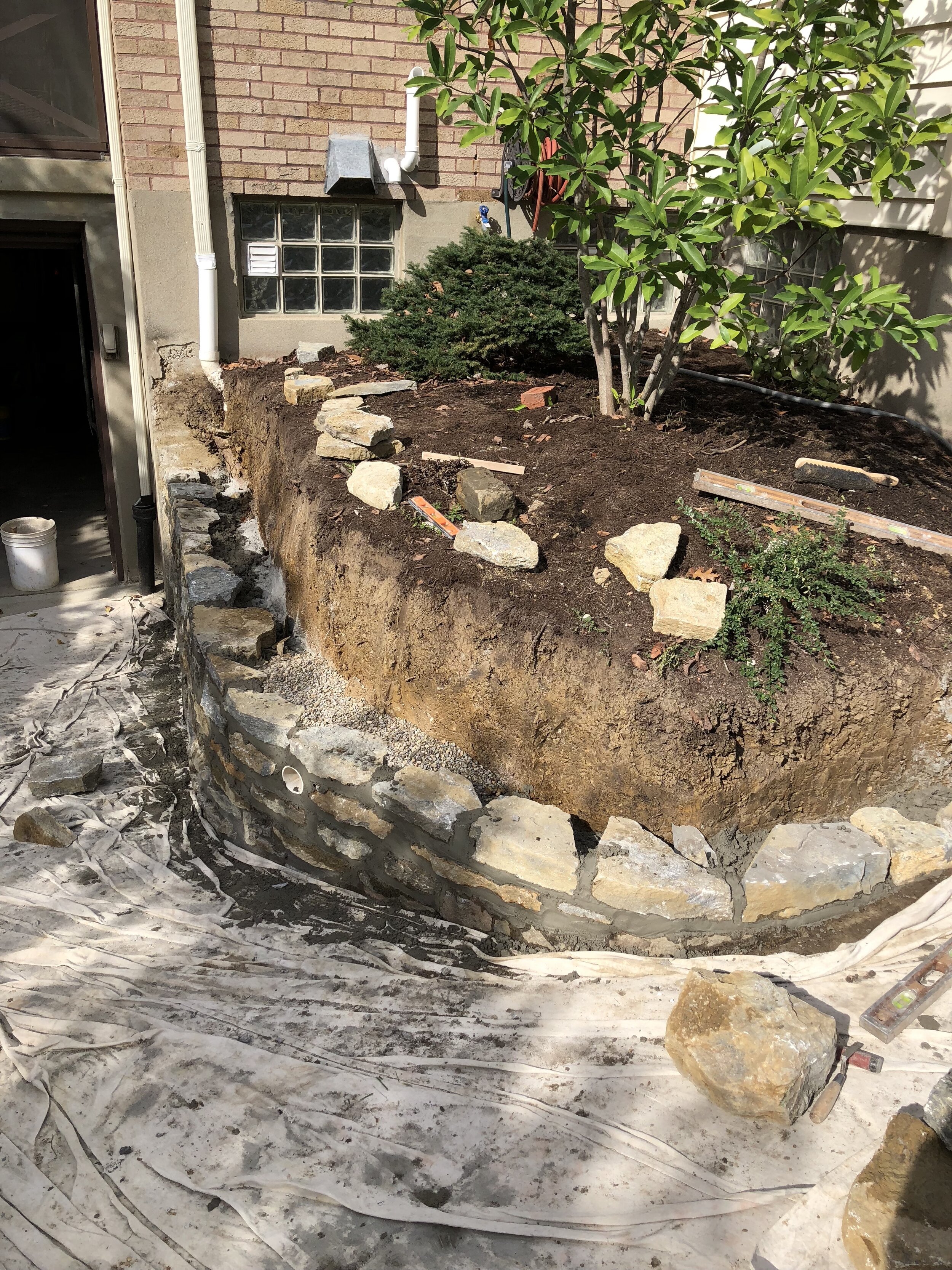 Stone wall rebuild and redesign photo 3