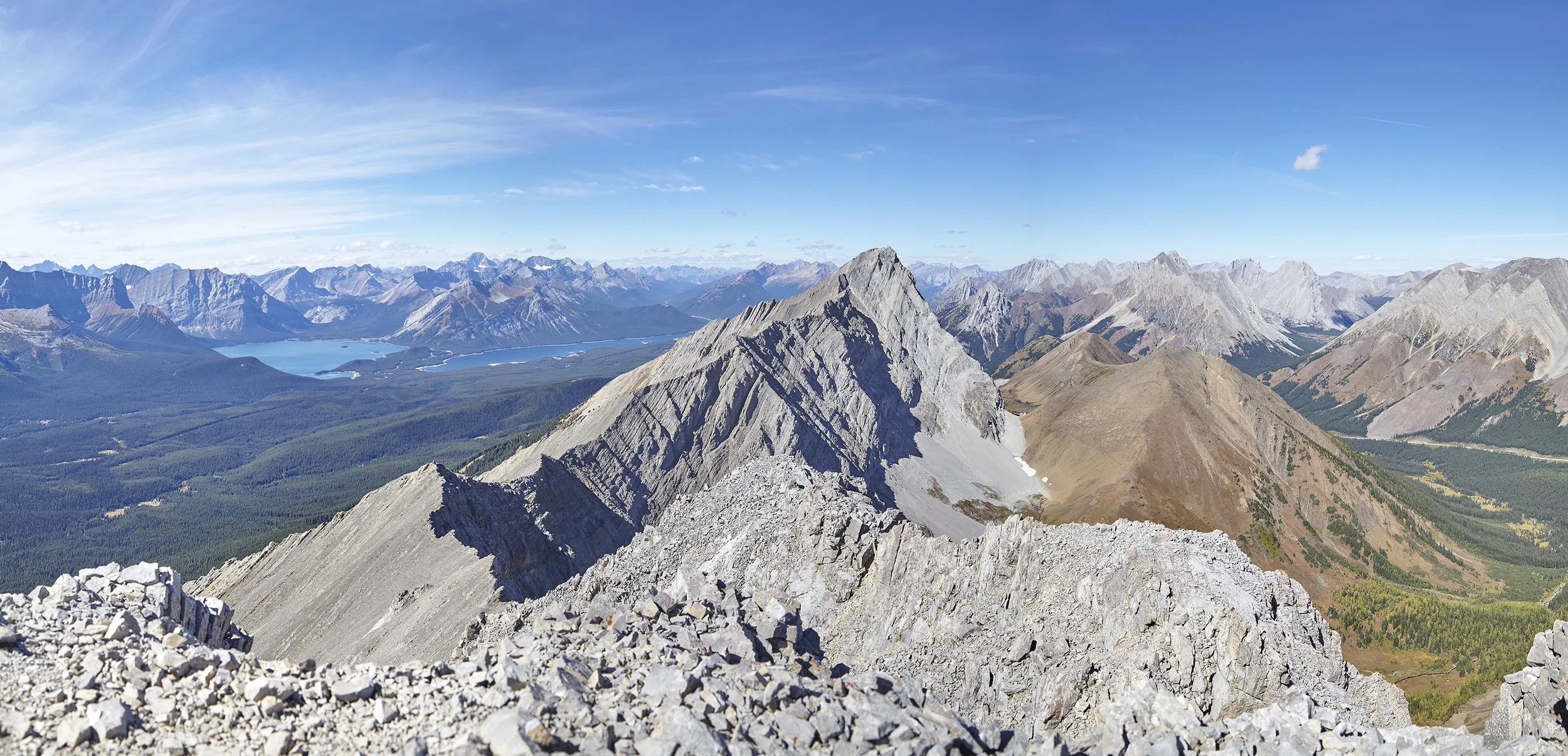 A summit panorama looking north towards Mount Pocaterra and the Kananaskis Lakes.