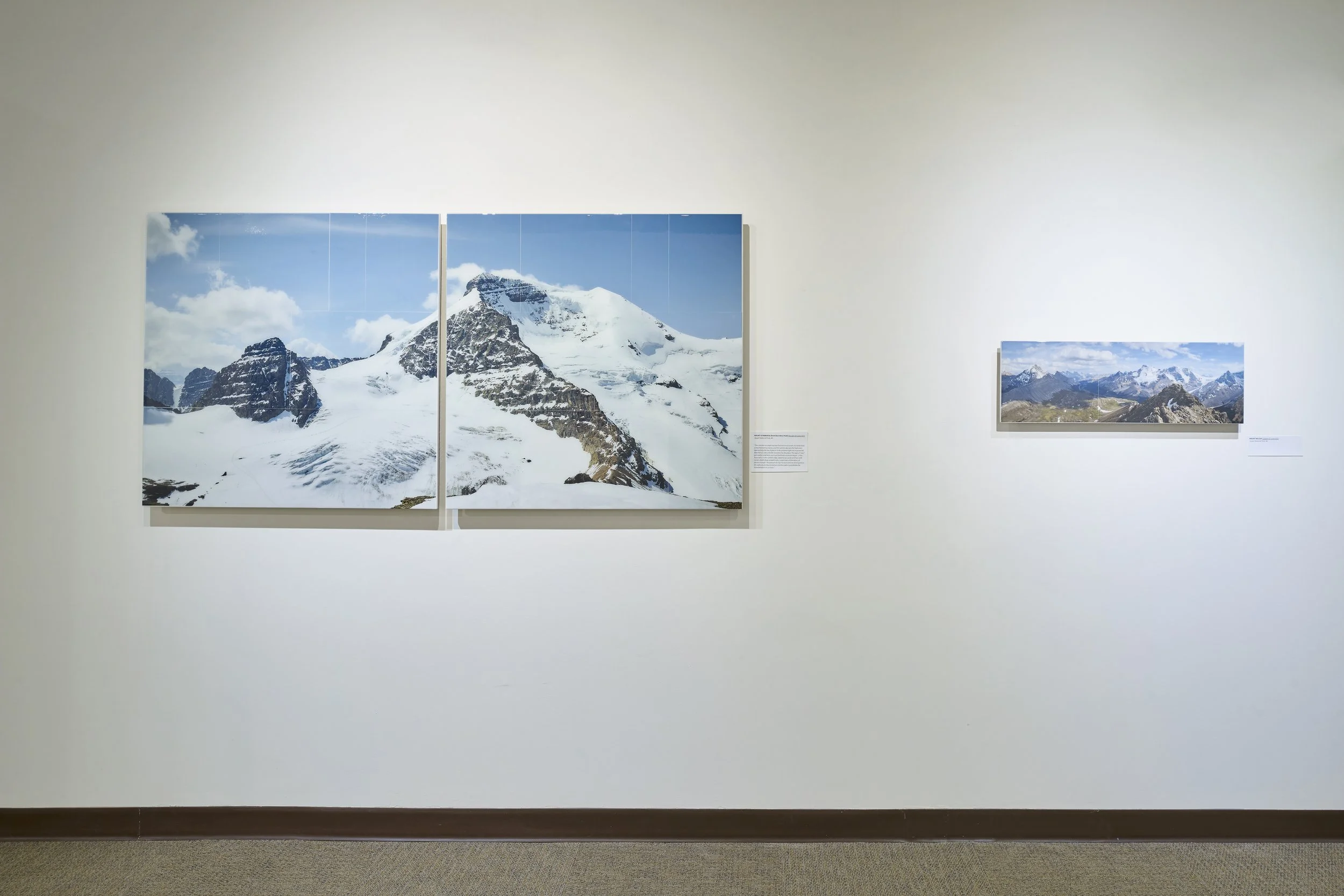   UPHIGH , Canmore Museum, 2024. Left image:  Mount Athabasca  2024. 2 - 36”x36” tiled photographs on hardboard with epoxy resin. Right image:  Mount Wilcox  2024. 10” x 30”, tiled photographs on hardboard with epoxy resin. 