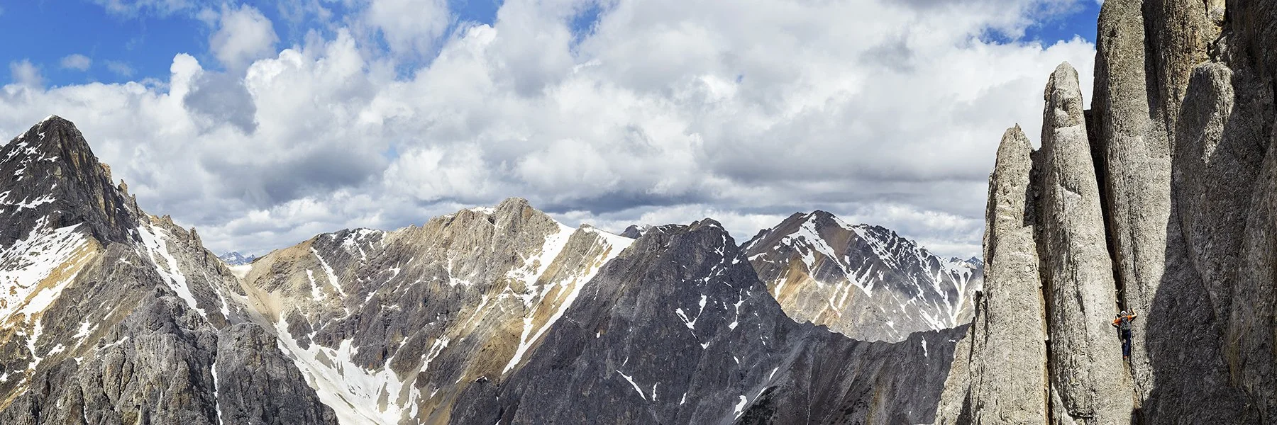  Yuri scaling the incomparable Mount Edith in Banff National Park. I’ve used a tighter crop before, but this version shows the full story and the scale of the moment.  