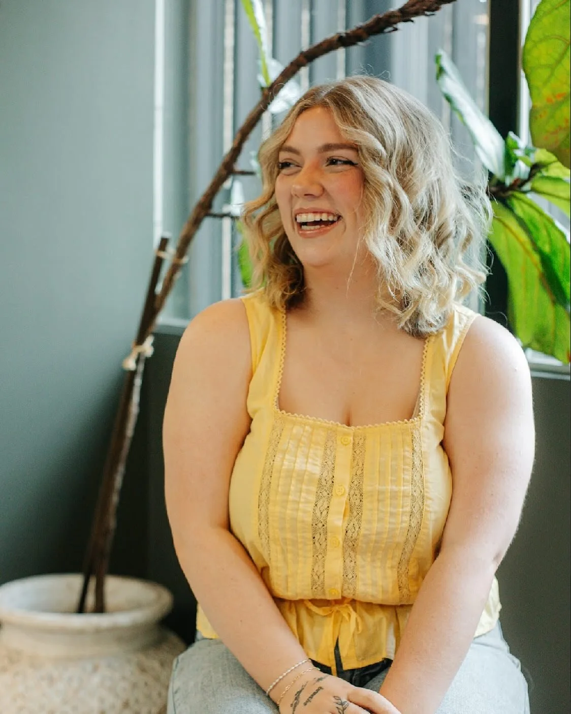 Meet the Phine team: @styled.by.karson is such an important part of our day! She has such a natural talent with all things hair and brings her sunshine smile to every client!