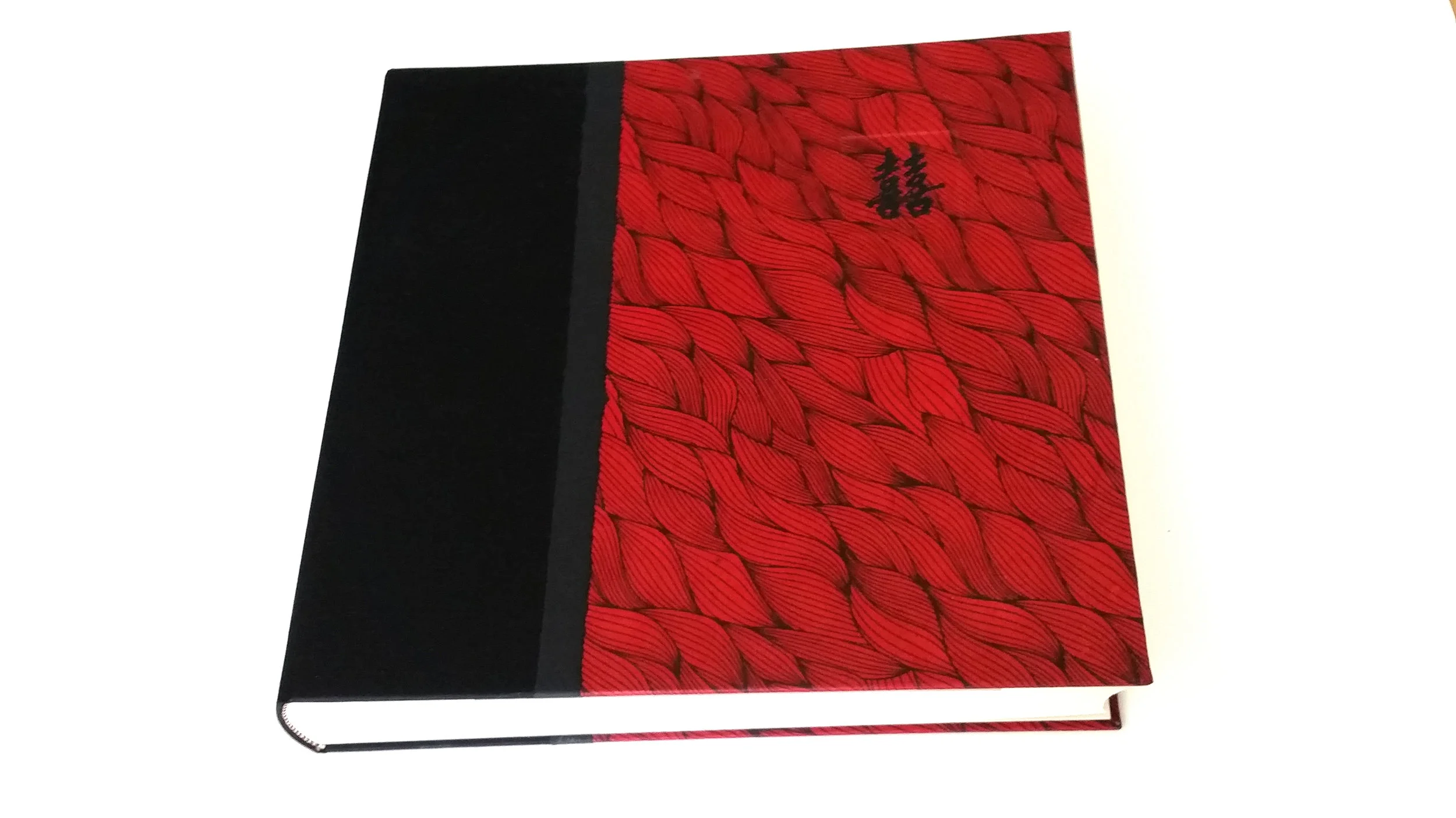 Custom hand-cut letter on a photo album