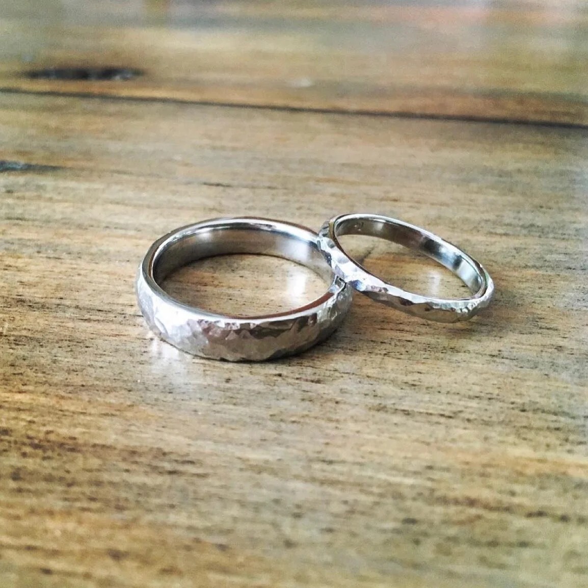 Getting started on a new Palladium ring design, and it reminded me of these his and hers wedding bands I made a while back. Hand carved in wax with all that gorgeous texture... 😍. #palladium #privatejewelernola #alternativebridal #instagood  #slowcr