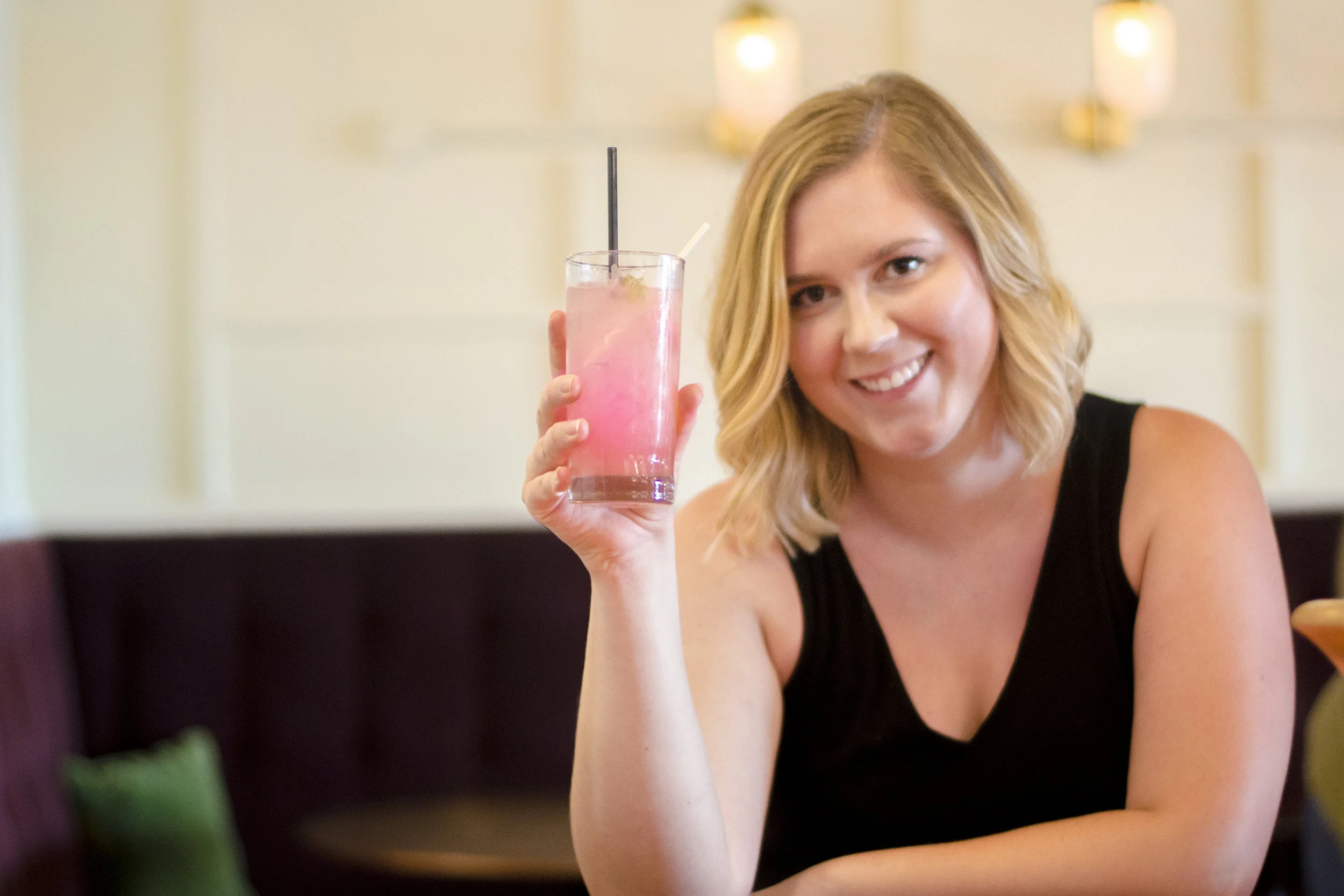 Autumn Heisler drinking a Summer Caretaker