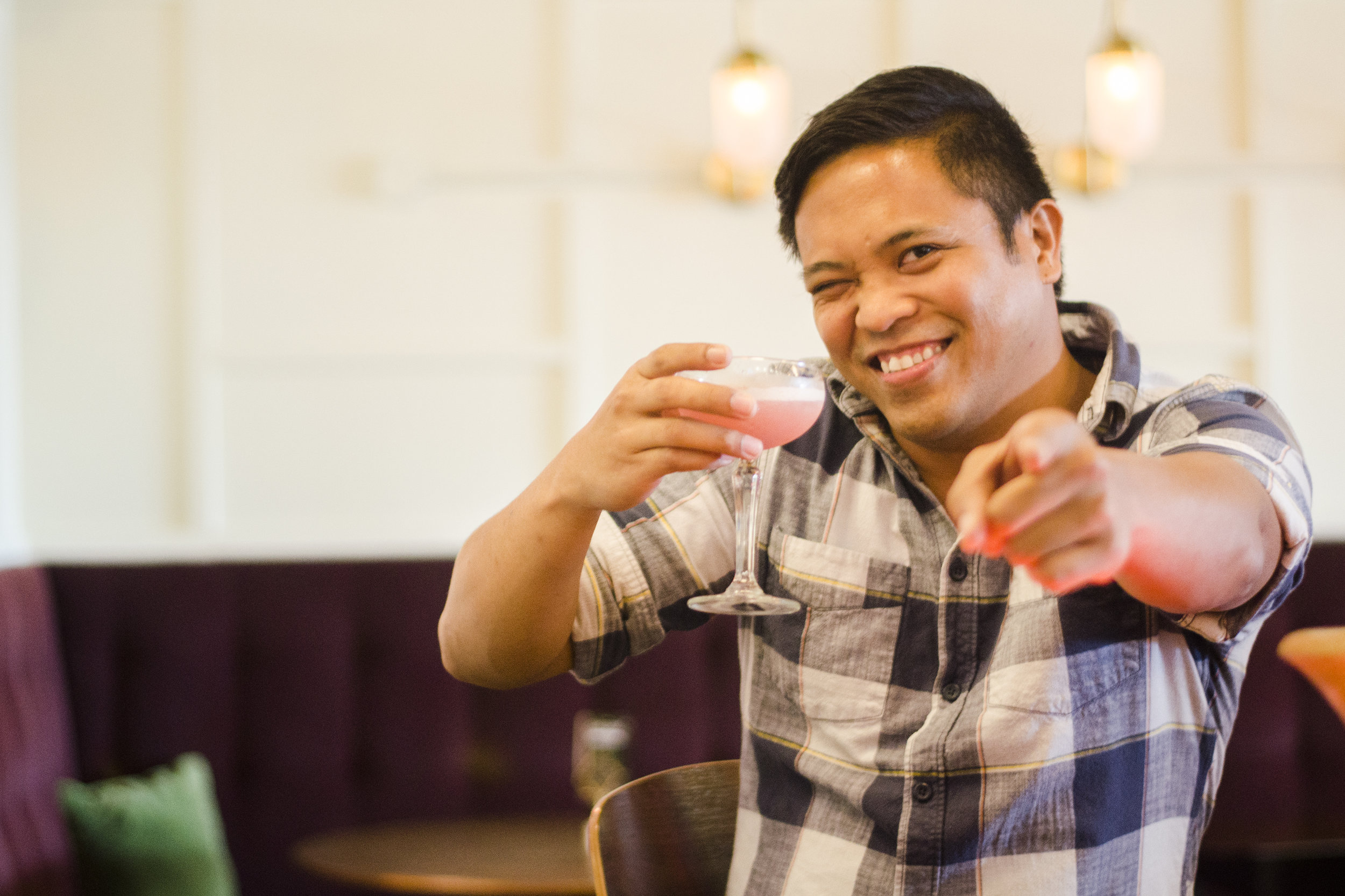 Ryan Cabyabyab drinking an Aviation