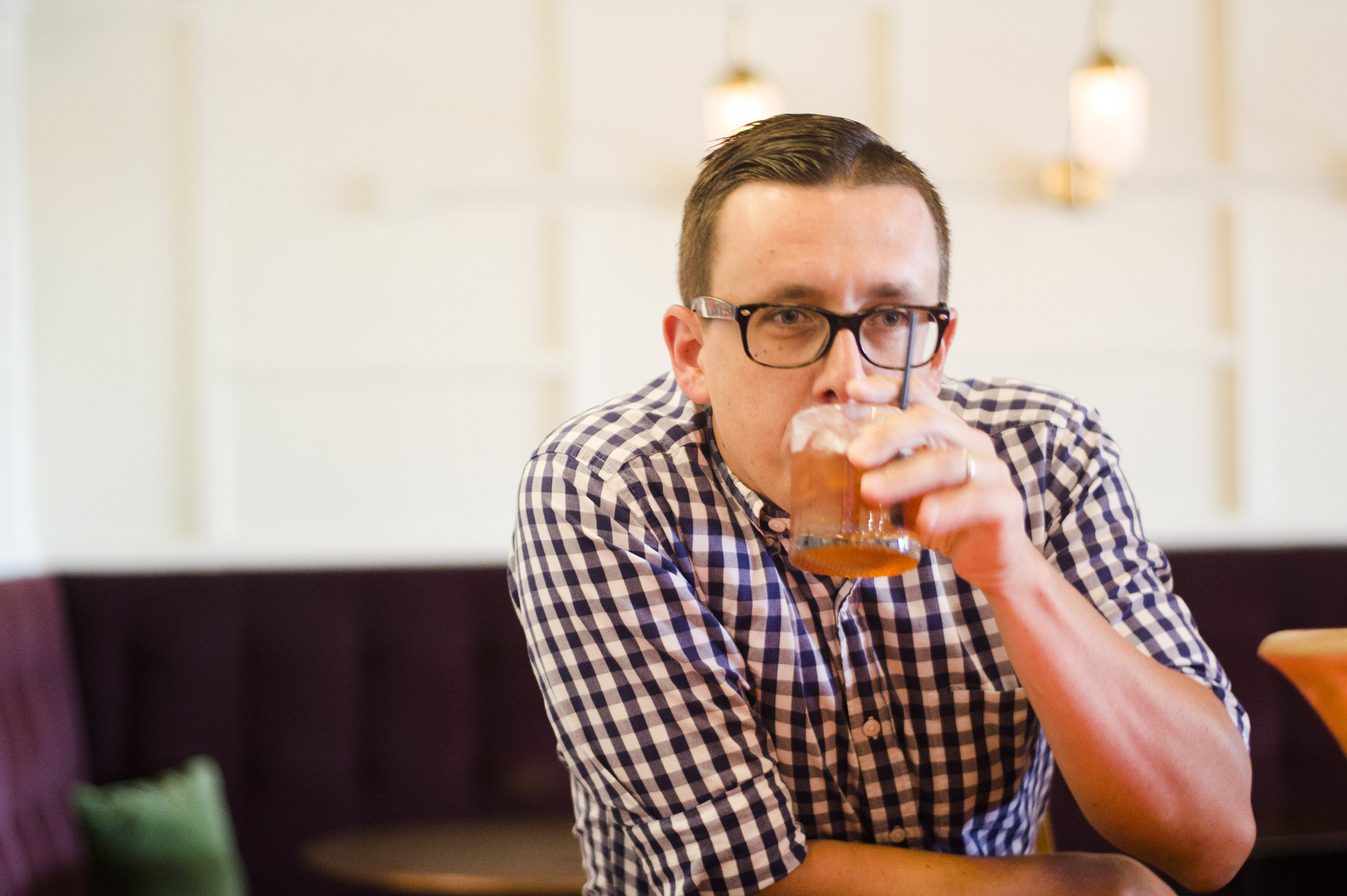 Chris Norris drinking an Old Fashioned