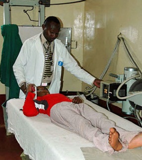  A doctor at the Sugarbaker Memorial Clinic gives a child a checkup exam. 