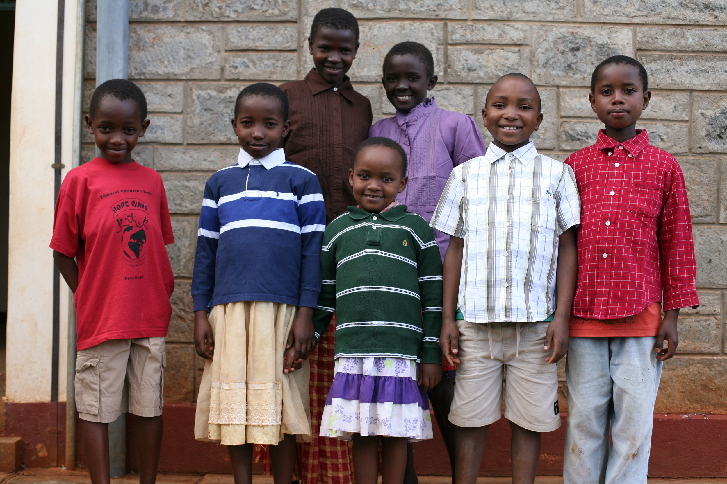  Children at Tumaini wait outside of the clinic for their checkup. 