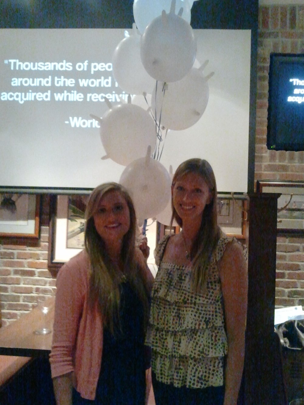  Geneva and Hannah stand in front of the premier of the 2013 documentary film.&nbsp; 