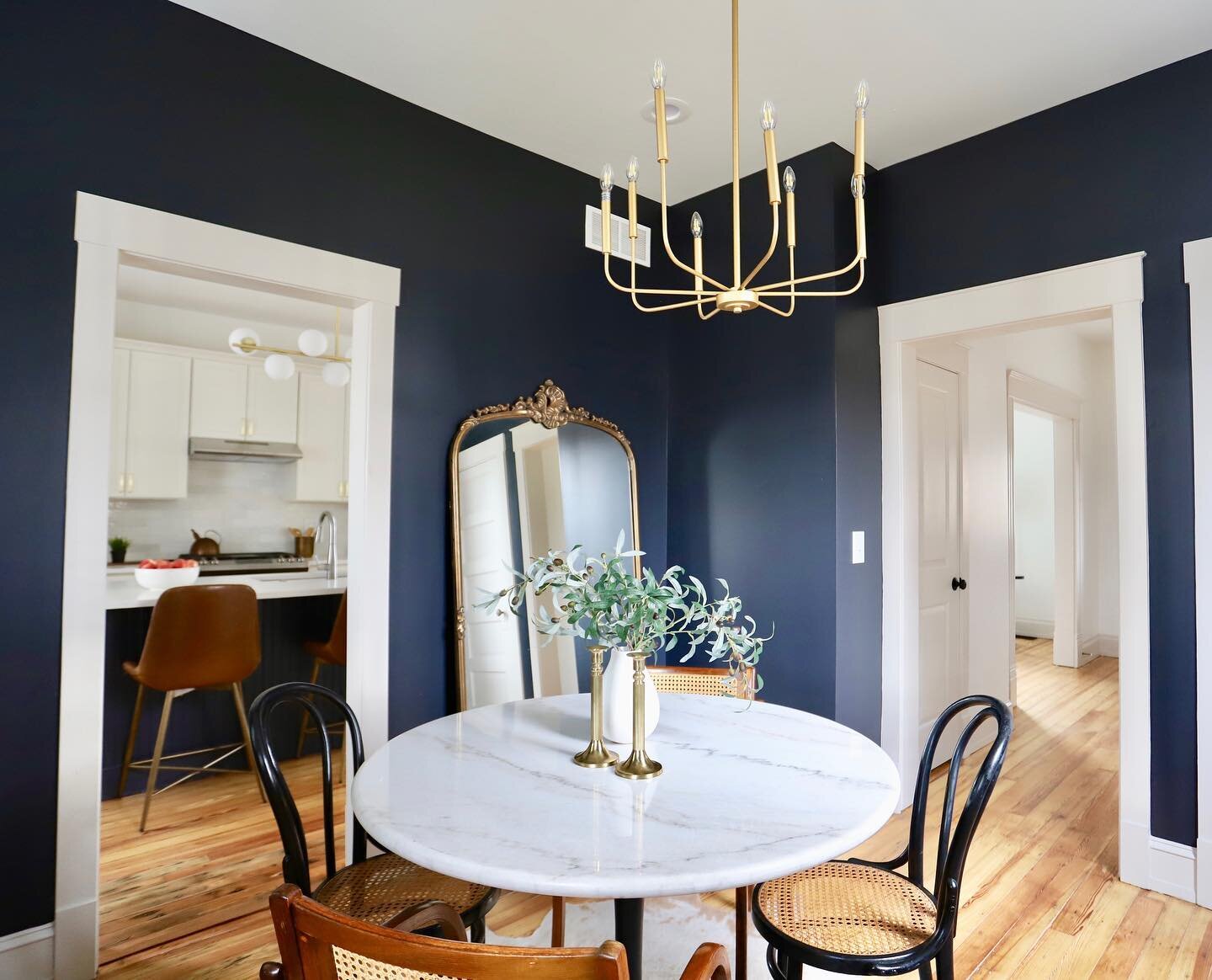 From an awkward and cramped kitchen to a dark and dramatic dining space. This small room is perfectly adequate for a dining space in this small 2-bed home. Moving it into the former kitchen space allowed us to use the massive dining room as the new k