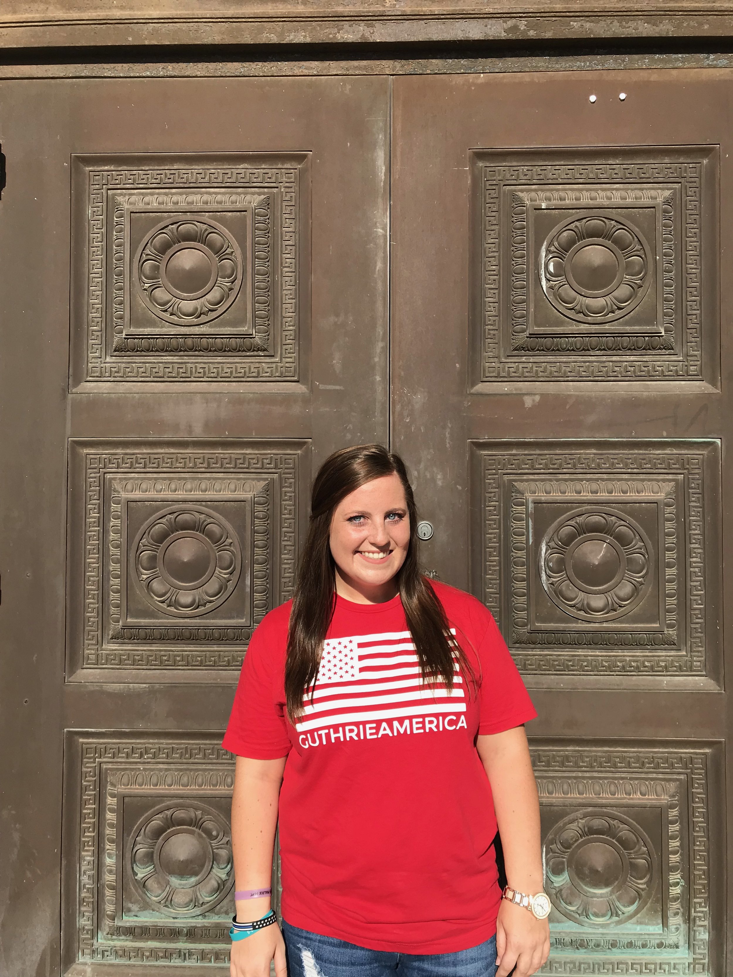 mollie Swartzbaugh at temple in guthrie in a guthrie america tee.jpg