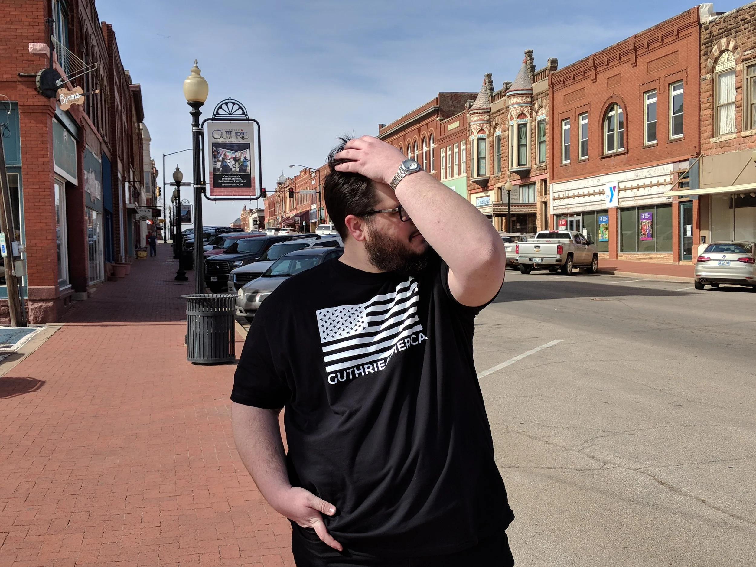 jeffery standing in downtown guthrie oklahoma.jpg