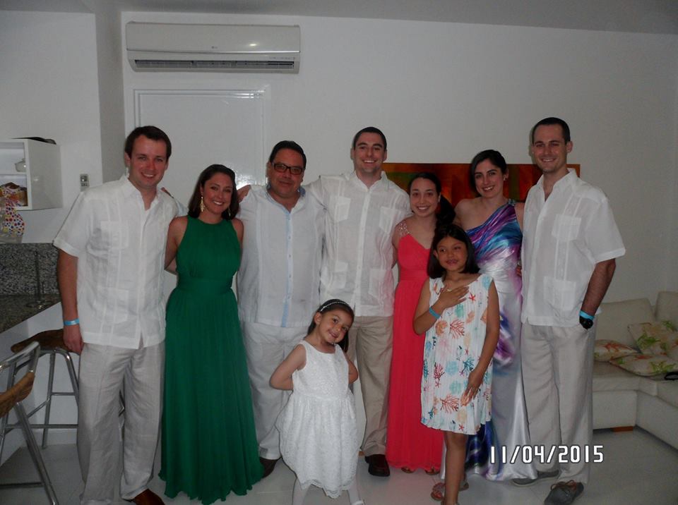 La Familia Sanchez all dolled up! The men wear white linen shirts and khaki pants at Cartagena weddings.