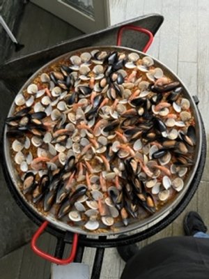 Paella with prawns, clams, and mussels.