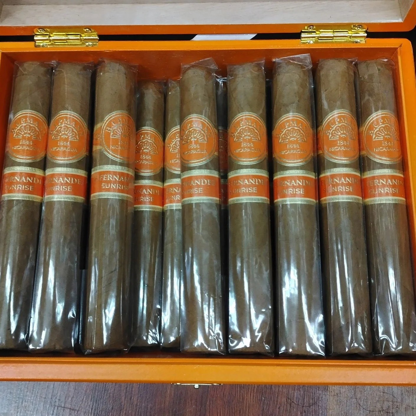#NewCigarArrival - The third release in the very popular H. Upmann by AJ Fernandez series has arrived in our Central PA humidors: The H. Upmann Sunrise. 🌅 

"Crafted with an Ecuadorian Connecticut wrapper over Nicaraguan tobaccos, it delivers a
