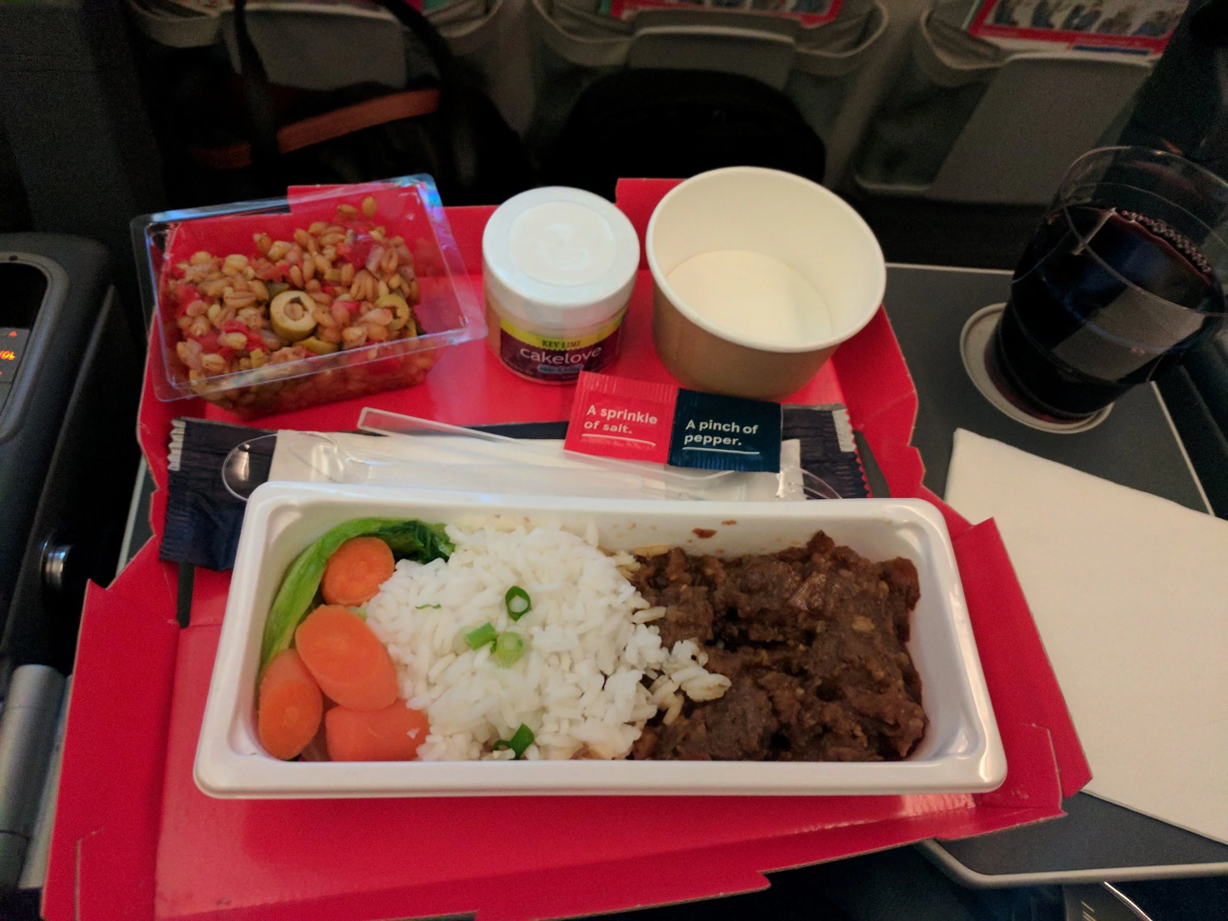 Included in our LowFare+. 3 courses and a glass of wine. Food was just meh, pretty typical of most coach-level airline offerings
