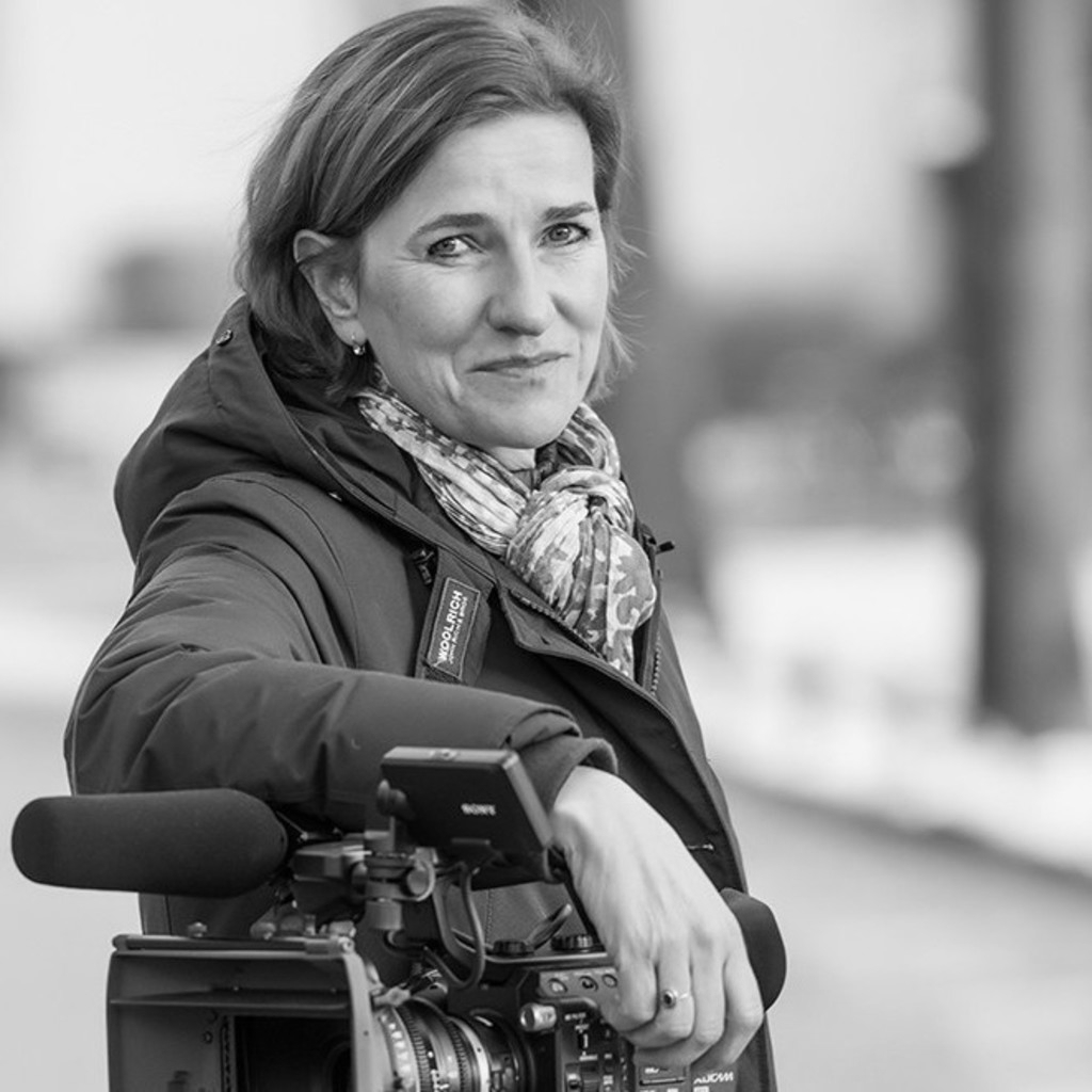 Woj is a Berlin based documentary filmmaker &amp; producer for German television, radio &amp; print media with an array of prestigious awards to her name. Whilst at the Free University of Berlin her studies included German language &amp; culture, Am…