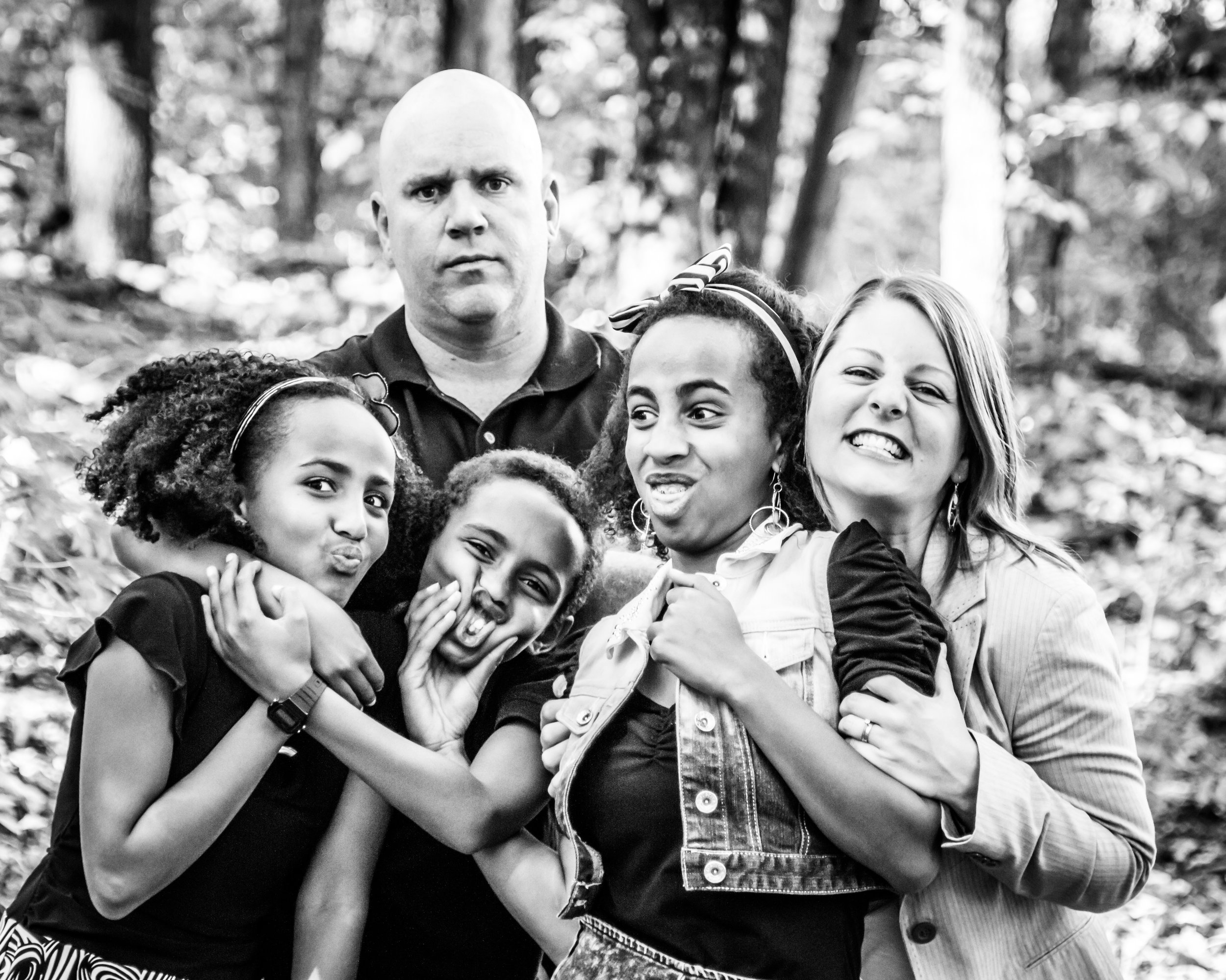 Tracy Dunham, new Communications Team volunteer, at a fun photo shoot with her husband Rob, and three Ethiopian-born children.