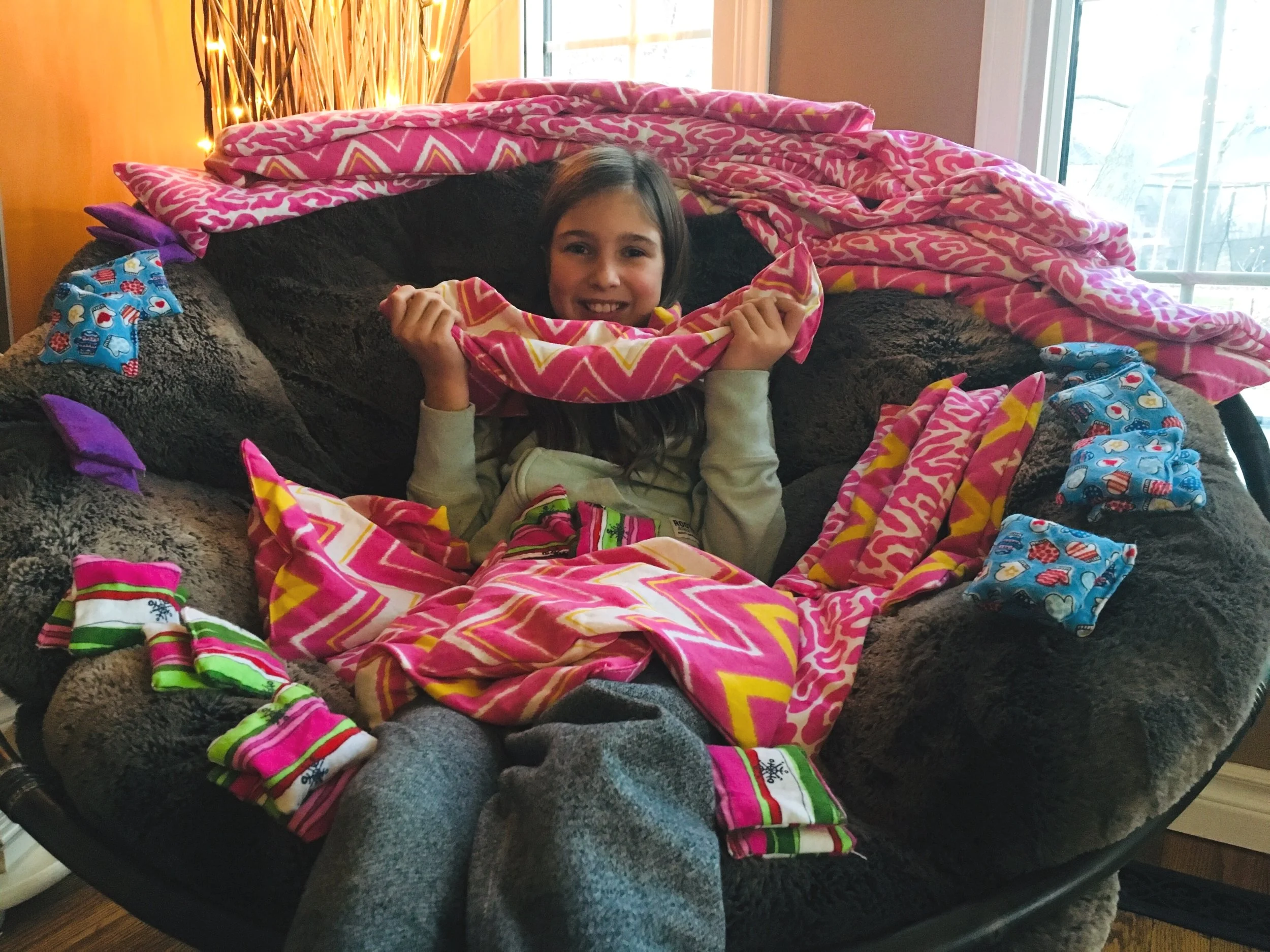 Olivia Wedlake, 10, is sewing hand warmers, eye pillows and warming neck pillows to raise money for toys for children in Ethiopia!