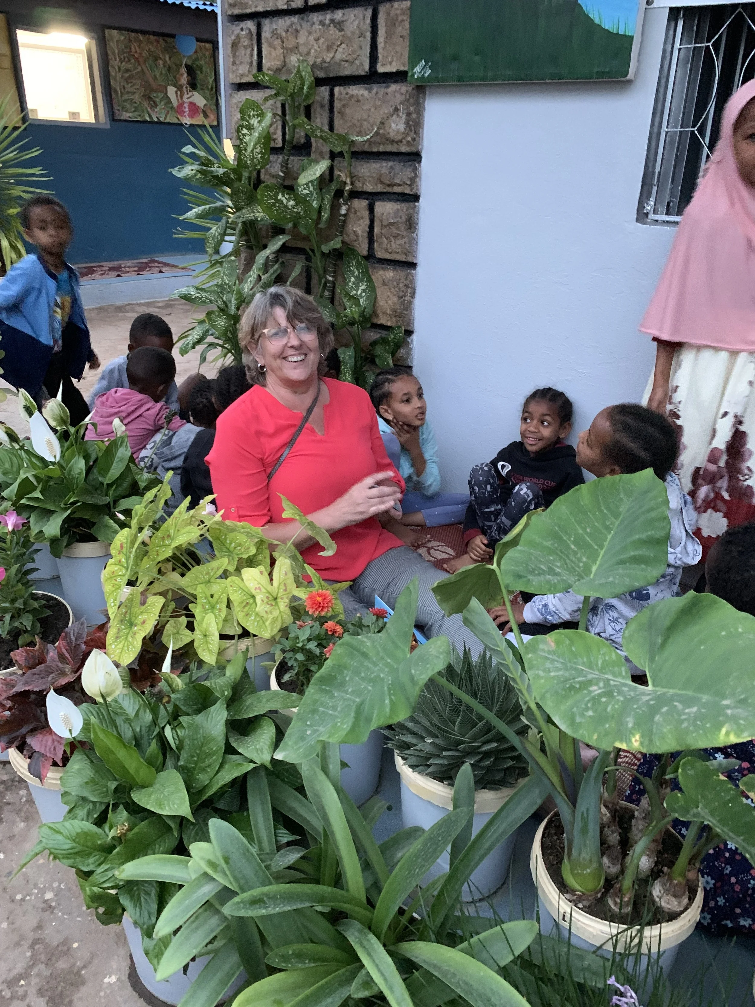 Helmy playing with kids laughing.jpg