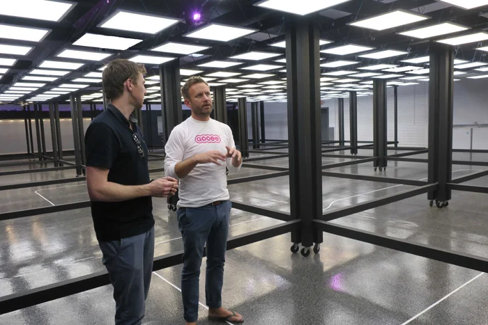 Gary and Gooee CTO Simon Coombes discuss light fixture testing within the facility
