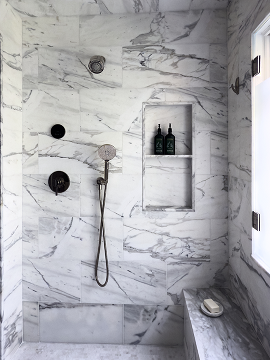 Marble shower in luxury Summit NJ bathroom.png
