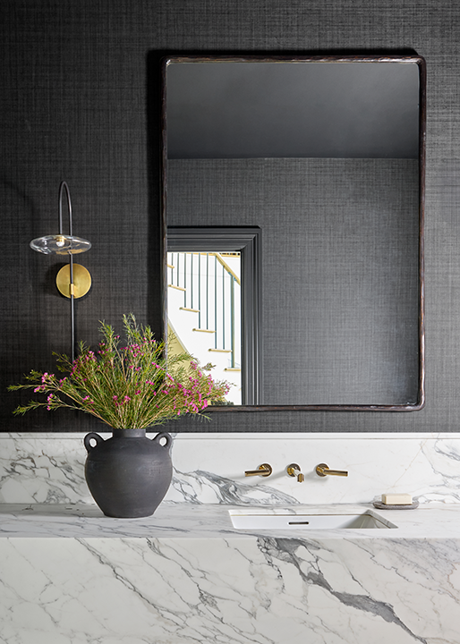 Moody black and marble powder room in luxury Summit NJ renovation.png