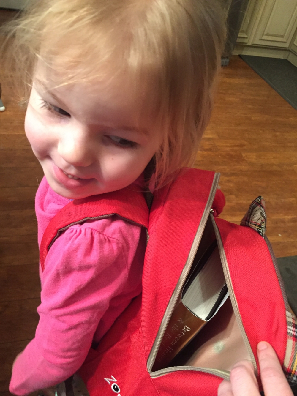 Della snuck her book to preschool the other day . . . she just couldn't put it down!