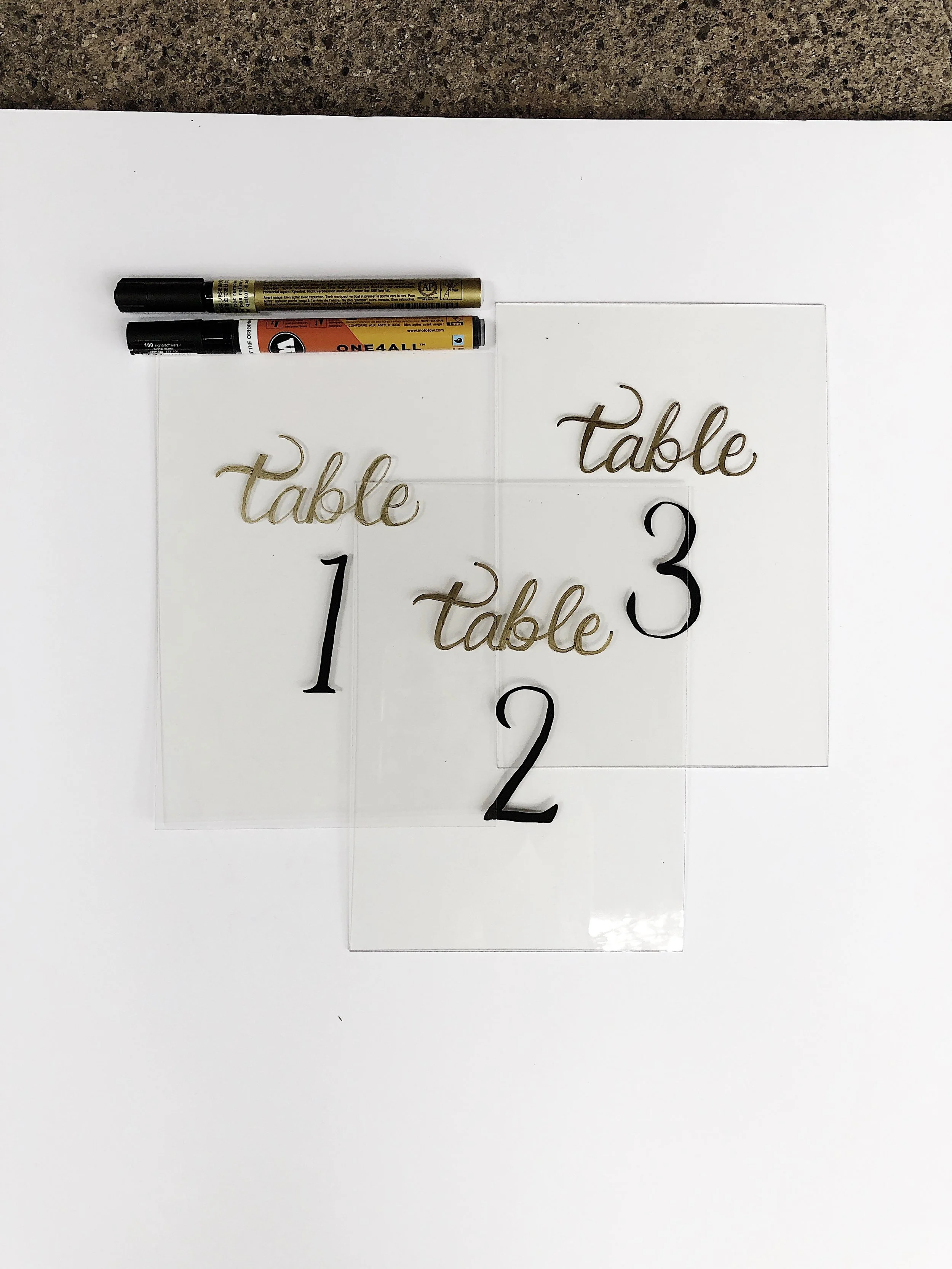 handlettered table signs