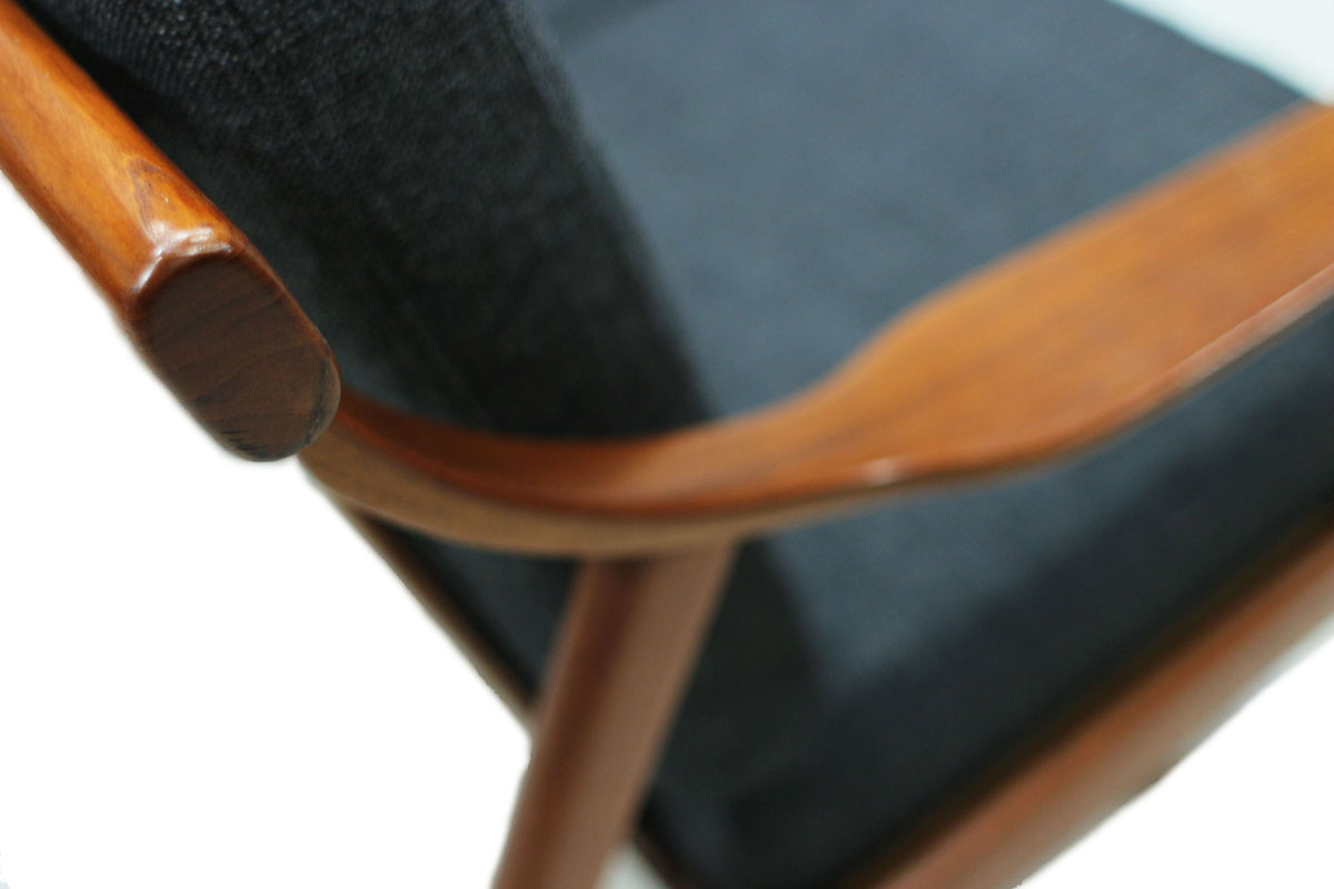 1960's Danish Designer MCM Teakwood Sofa with Sculpted Armrests and Dark Grey Cushions Designed by Arne Hovmand Olsen