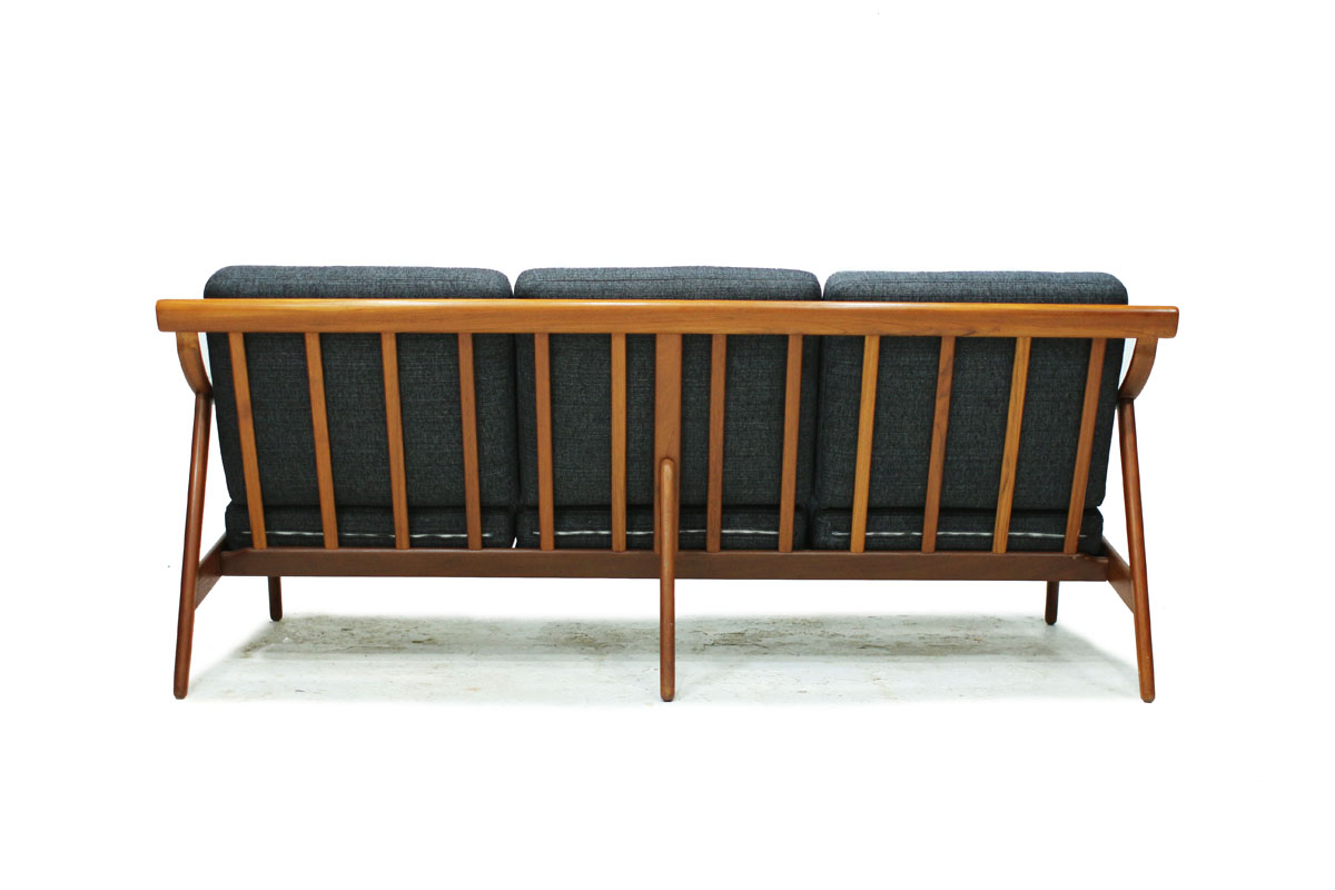 1960's Danish Designer MCM Teakwood Sofa with Sculpted Armrests and Dark Grey Cushions Designed by Arne Hovmand Olsen
