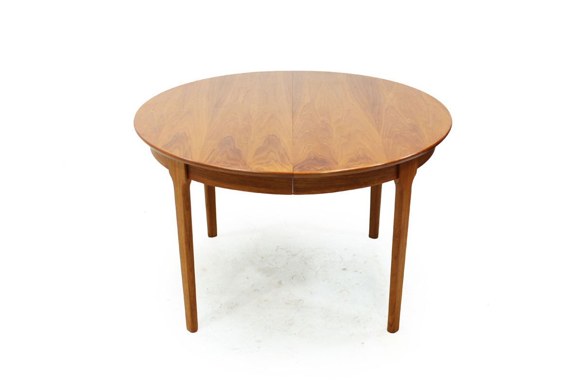 Mid Century Modern Round Extendable to Oval Teakwood Table with 2 leafs and notched leg system