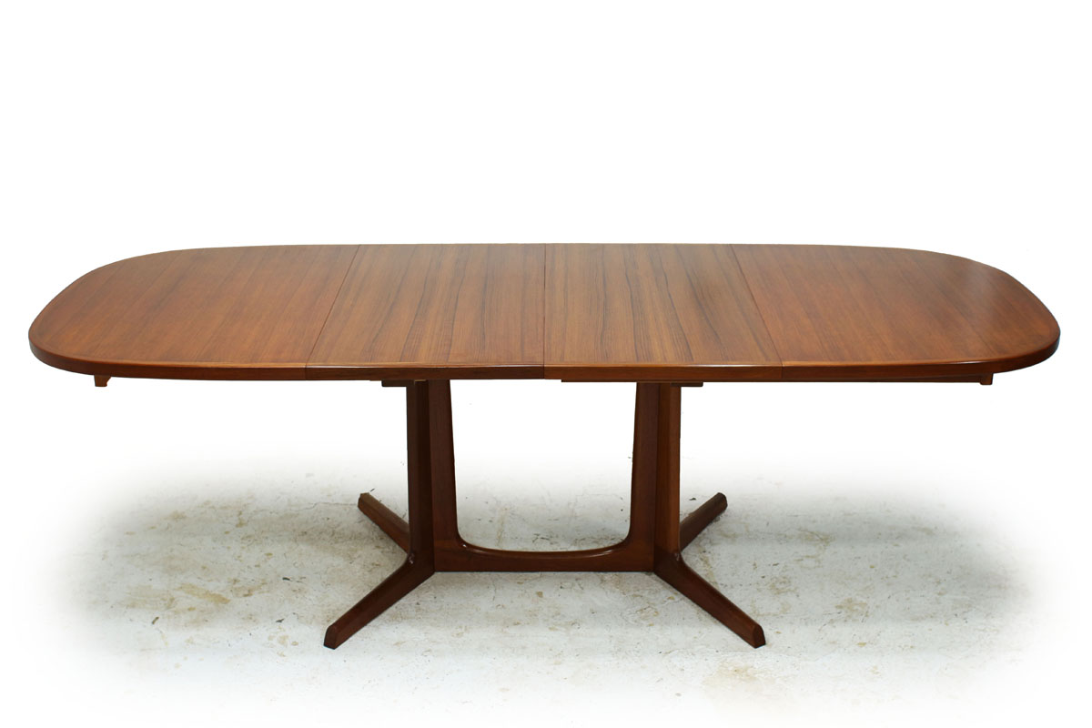 Danish Designer Mid Century Modern Extendable Teak Dining Table Designed by Gudme Mobelfabrik Niels Moller
